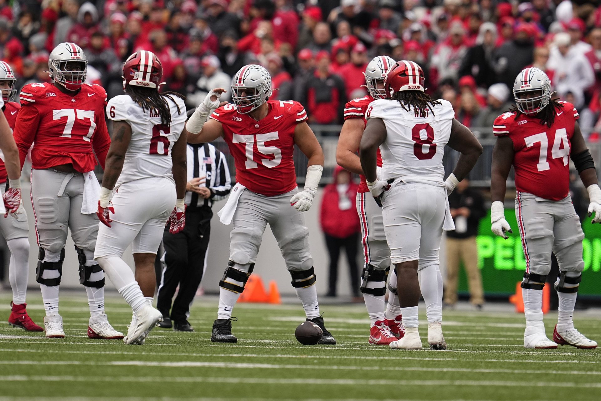 Ohio State Buckeyes offensive lineman Carson Hinzman (75) calls out a play during the second half of the NCAA football game against the Indiana Hoosiers at Ohio Stadium in Columbus on Saturday, Nov. 23, 2024. Ohio State won 38-15.