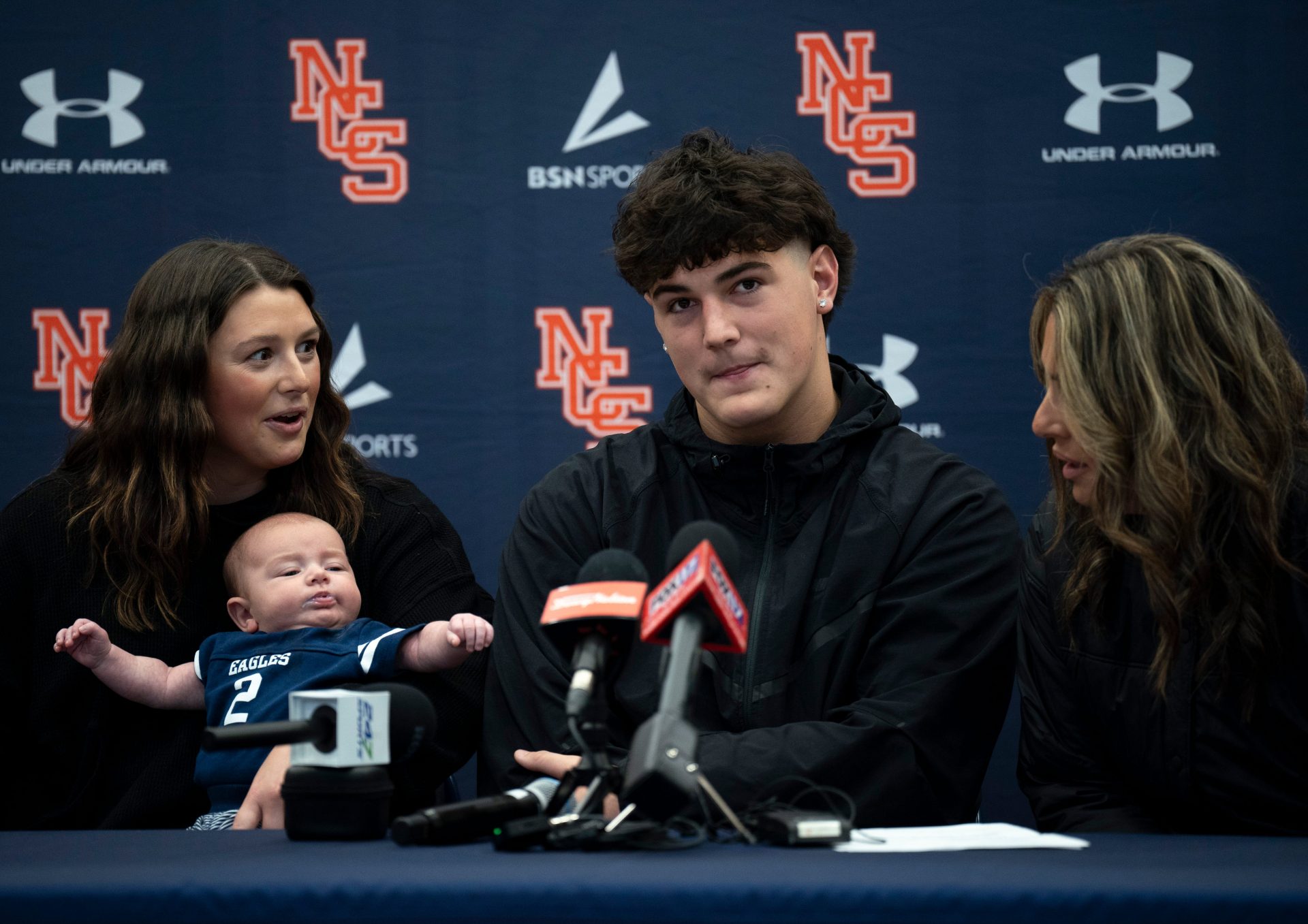 Nashville Christian's five-star quarterback Jared Curtis announces his decision to sign with Georgia with his sister, Kaitlyn Allsbrooks, nephew, Hudson, 2 months, and mom, Barbara Curtis