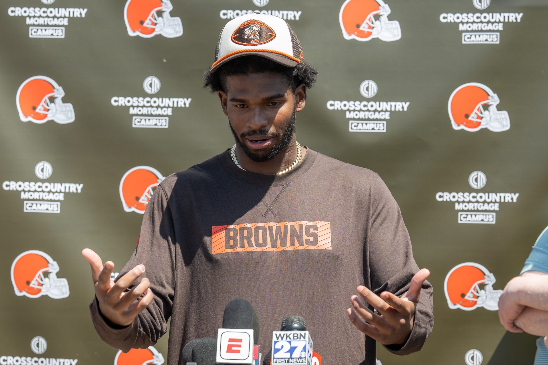 Cleveland Browns quarterback Shedeur Sanders (12) talks to the media during rookie minicamp at CrossCountry Mortgage Campus.