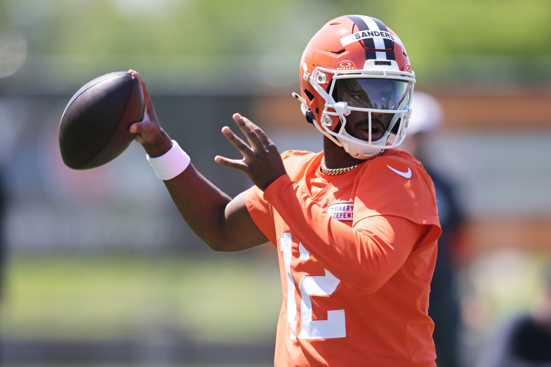 Cleveland Browns quarterback Shedeur Sanders (12) throws a pass during rookie minicamp at CrossCountry Mortgage Campus.