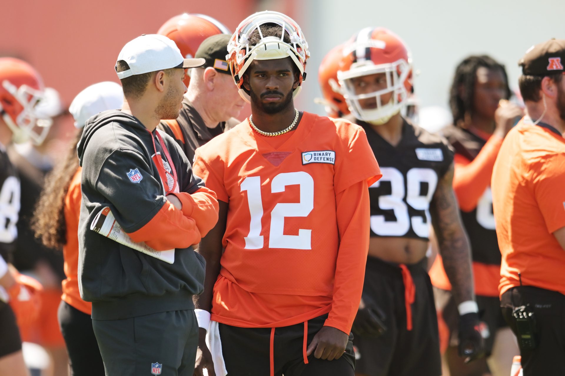 Cleveland Browns quarterback Shedeur Sanders (12) waits his turn for a drill during rookie minicamp at CrossCountry Mortgage Campus.