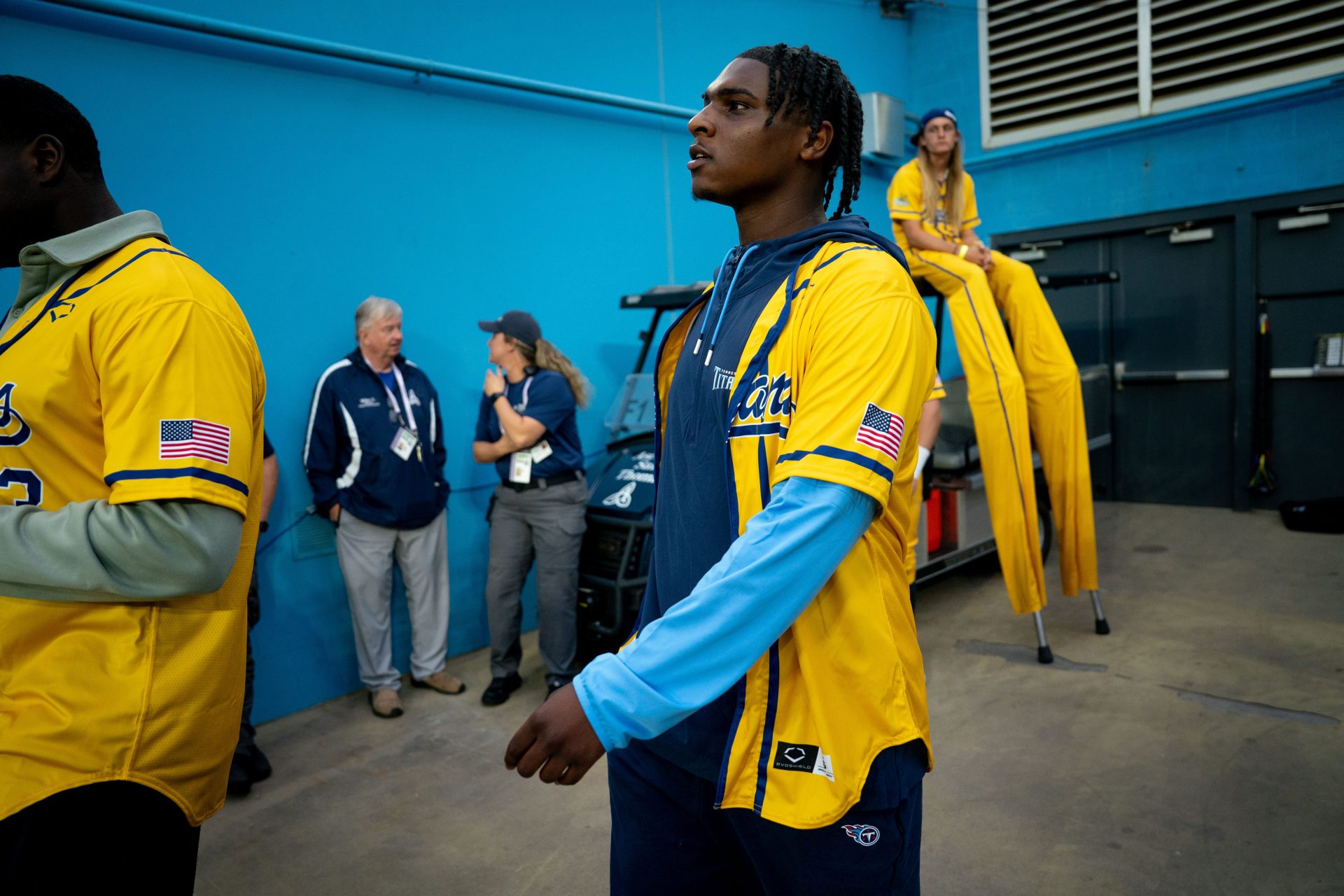 Tennessee Titans quarterback Cam Ward heads onto the field before a baseball game between the Savannah Bananas and the Party Animals at Nissan Stadium in Nashville, Tenn., Saturday, May 10, 2025.