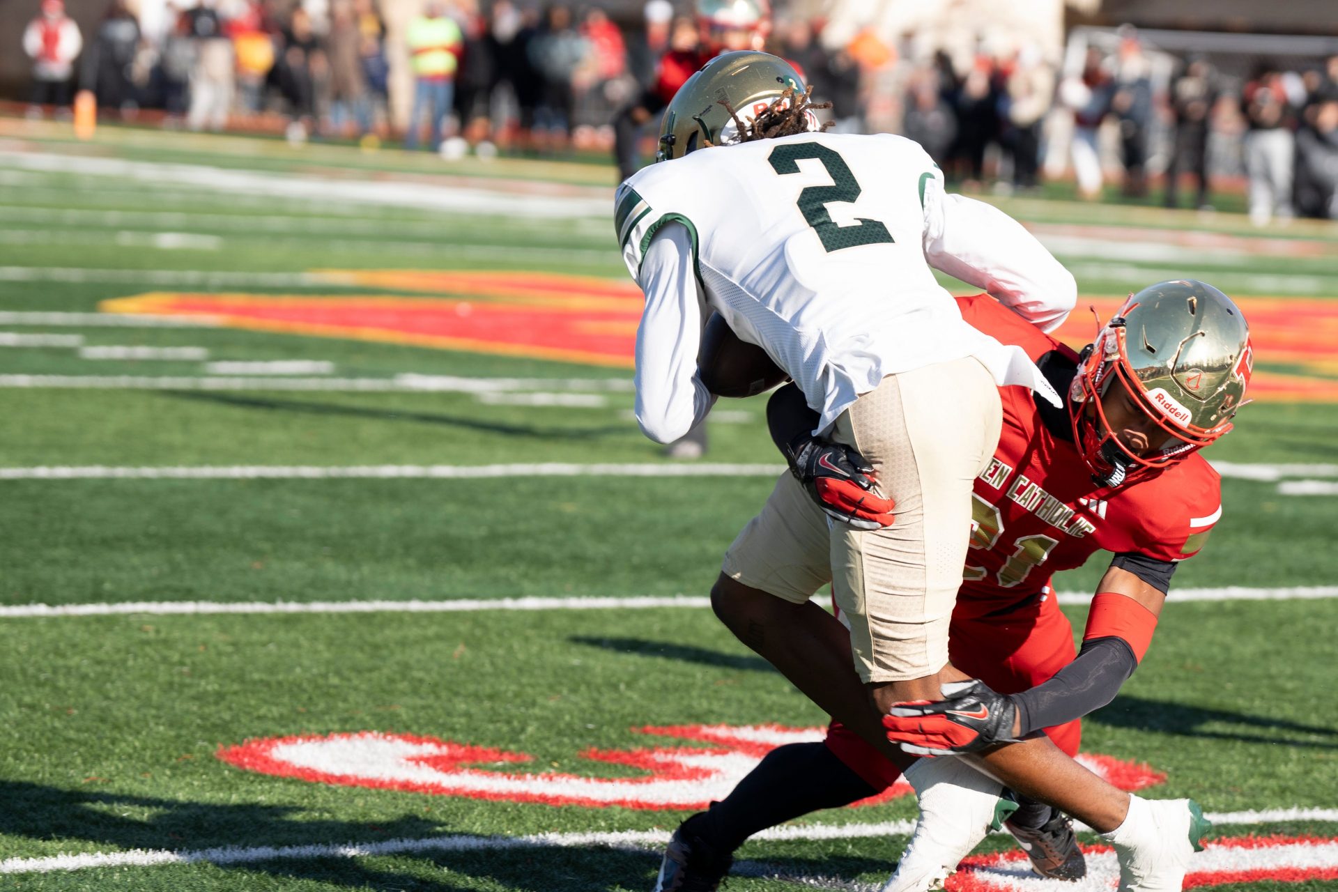 St. Joseph at Bergen Catholic in a Non-Public A football semifinal. BC #21 Jordan Thomas tackles SJ #2 Mekhi Rossignol.