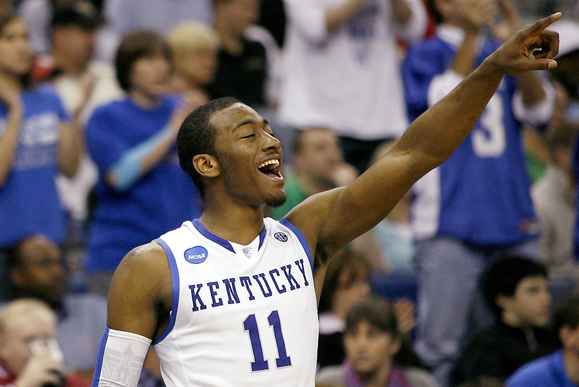 Kentucky Wildcats guard John Wall (11) celebrates a basket by a teammate against the Wake Forest Demon Deacons during the second half in the second round of the 2010 NCAA mens basketball tournament at the New Orleans Arena. Kentucky defeated Wake Forest 90-60.