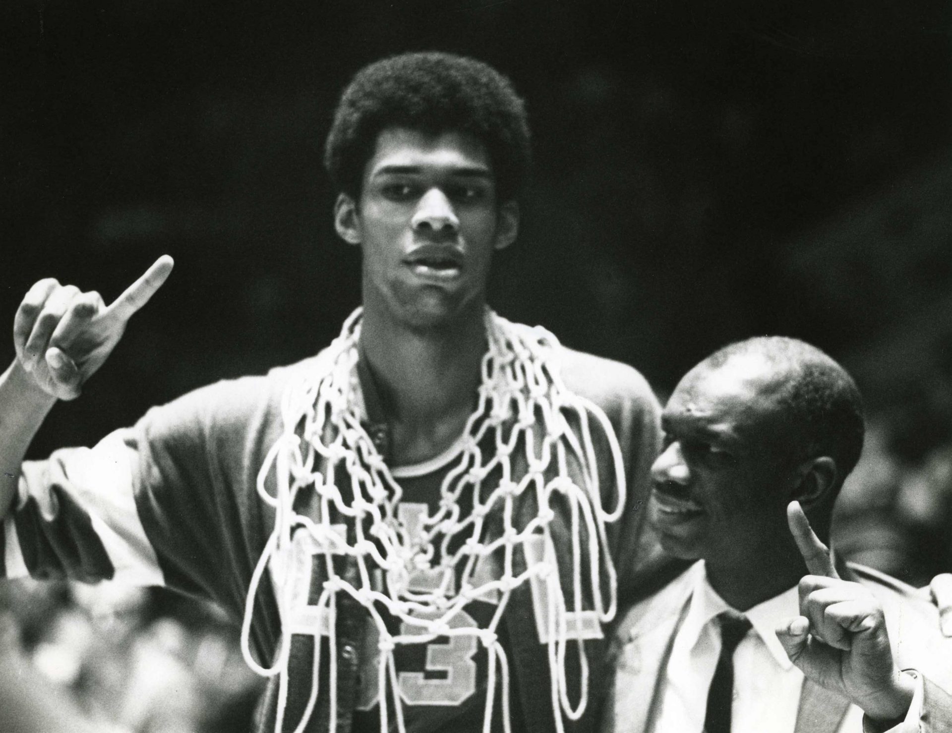 UCLA Bruins center Lew Alcindor (33) later known as Kareem Abdul-Jabbar with his father Lewis Alcindor Sr after defeating the Purdue Boilermakers 92-72 in the National Championship game at Freedom Hall.