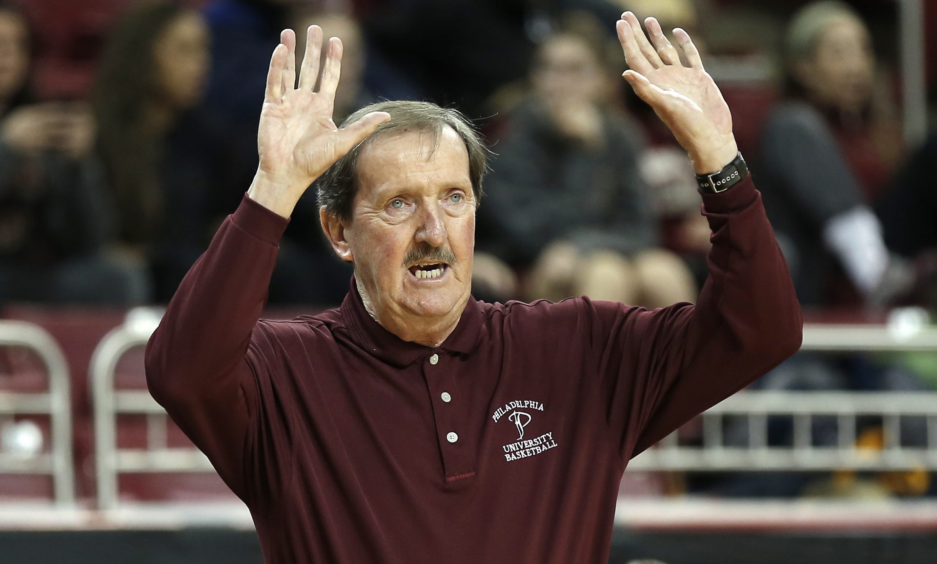 Philadelphia University head coach Herb Magee talks to his players during the second half of their 67-50 loss to Boston College at Silvio O. Conte Forum.