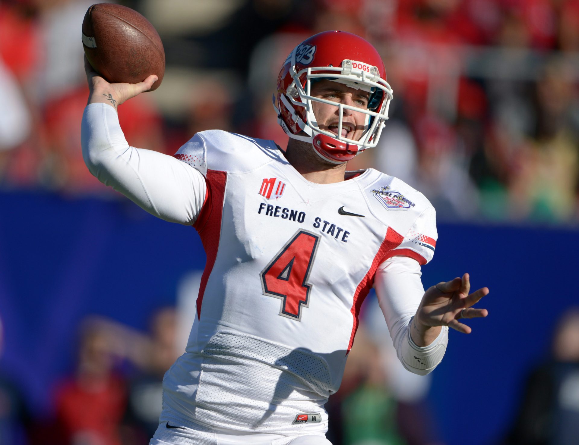 Fresno State Bulldogs quarterback Derek Carr (4) throws a pass against the Southern California Trojans in the Las Vegas Bowl at Sam Boyd Stadium.