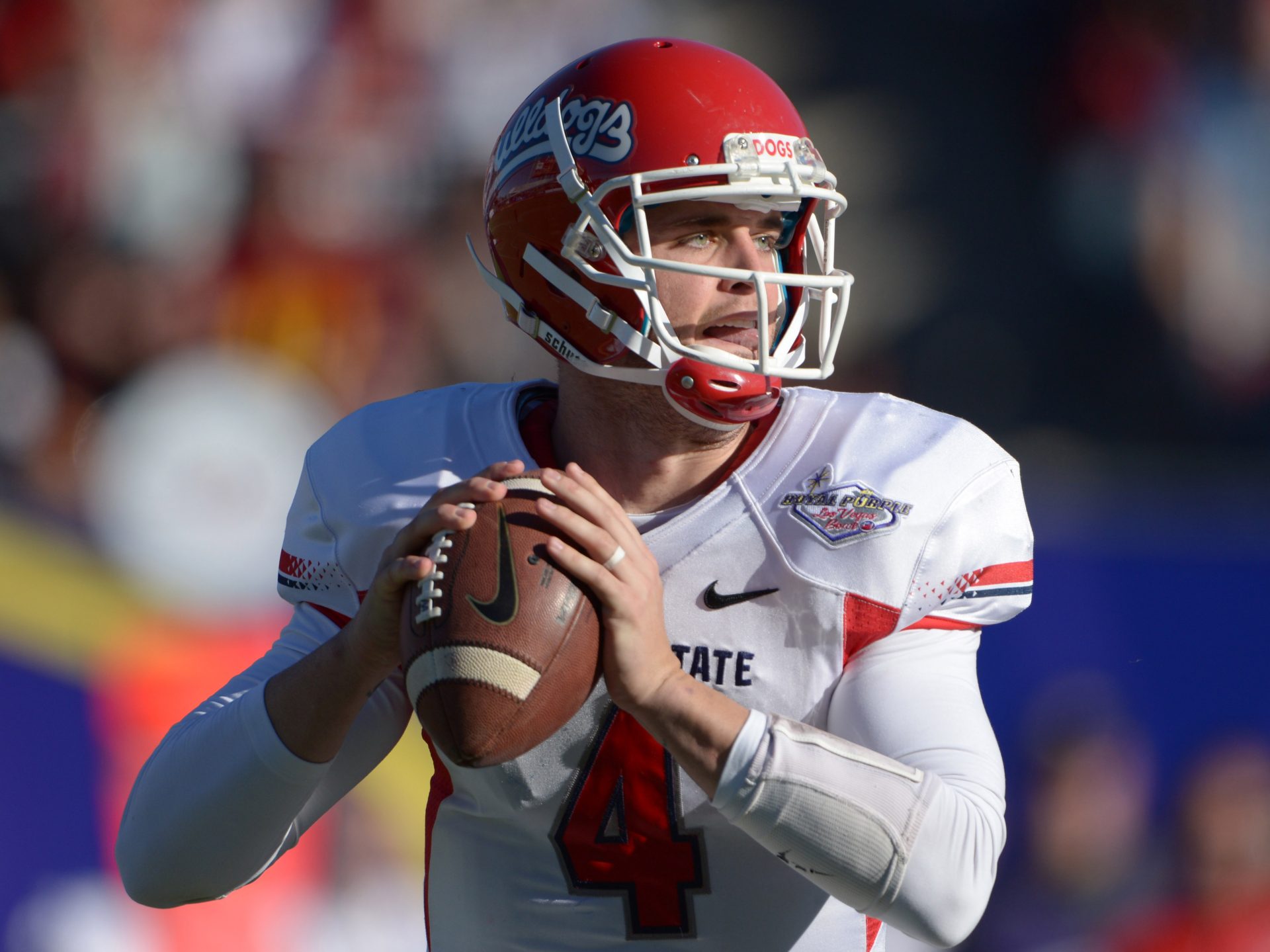 Fresno State Bulldogs quarterback Derek Carr (4) throws a pass against the Southern California Trojans in the Las Vegas Bowl at Sam Boyd Stadium.