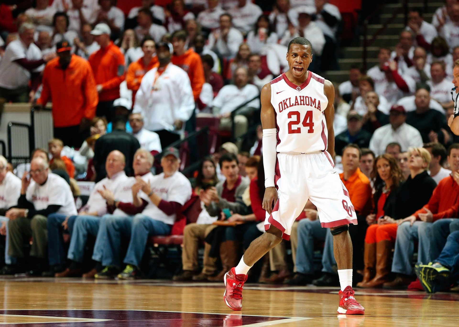 Oklahoma Sooners guard Buddy Hield (24) reacts during the first half against the Oklahoma State Cowboys at Lloyd Noble Center.