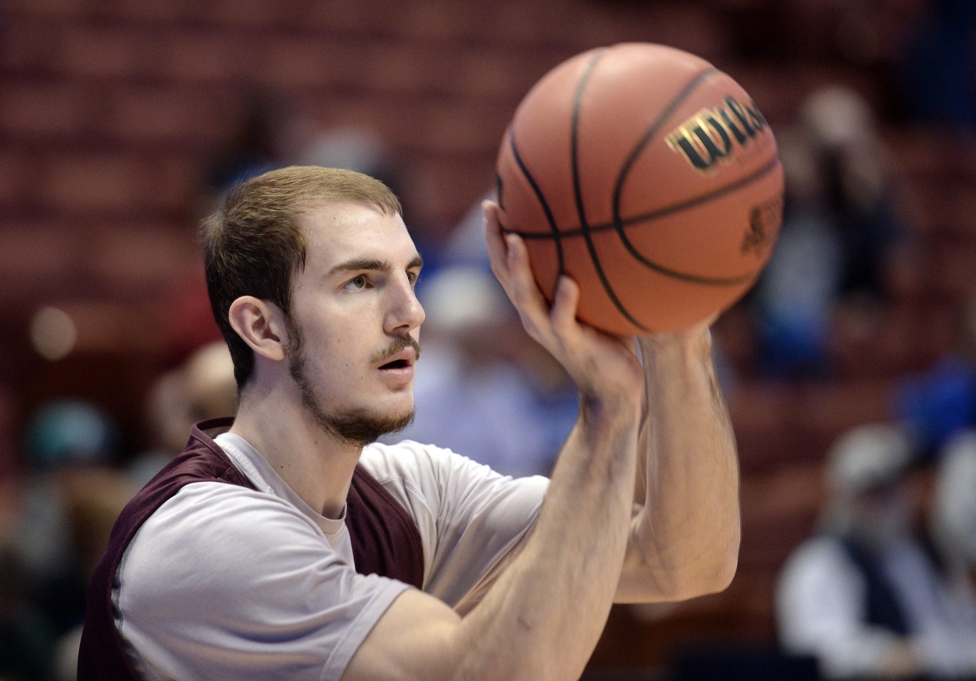 Texas A&M guard Alex Caruso (21) shoots during practice the day before the semifinals of the West regional of the NCAA Tournament at Honda Center.