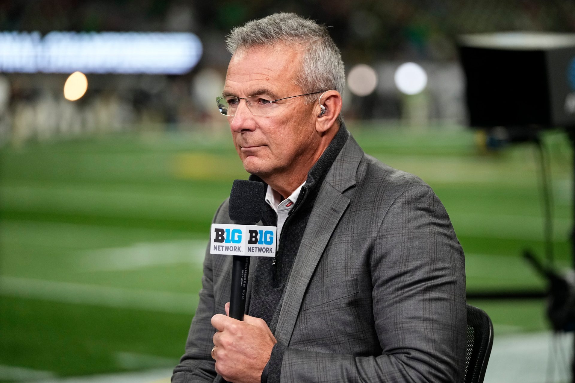 Former Ohio State Buckeyes head coach Urban Meyer broadcasts for the Big Ten Network prior to the College Football Playoff National Championship against the Notre Dame Fighting Irish at Mercedes-Benz Stadium in Atlanta on Jan. 20, 2025.