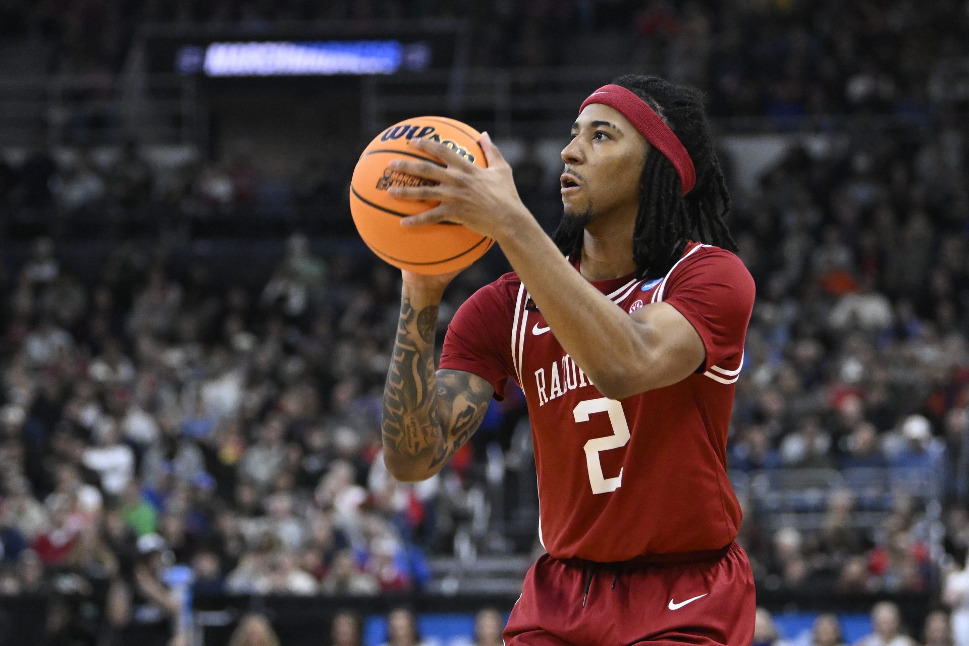 Arkansas Razorbacks guard Boogie Fland (2) controls the ball during the second half against the Kansas Jayhawks at Amica Mutual Pavilion.