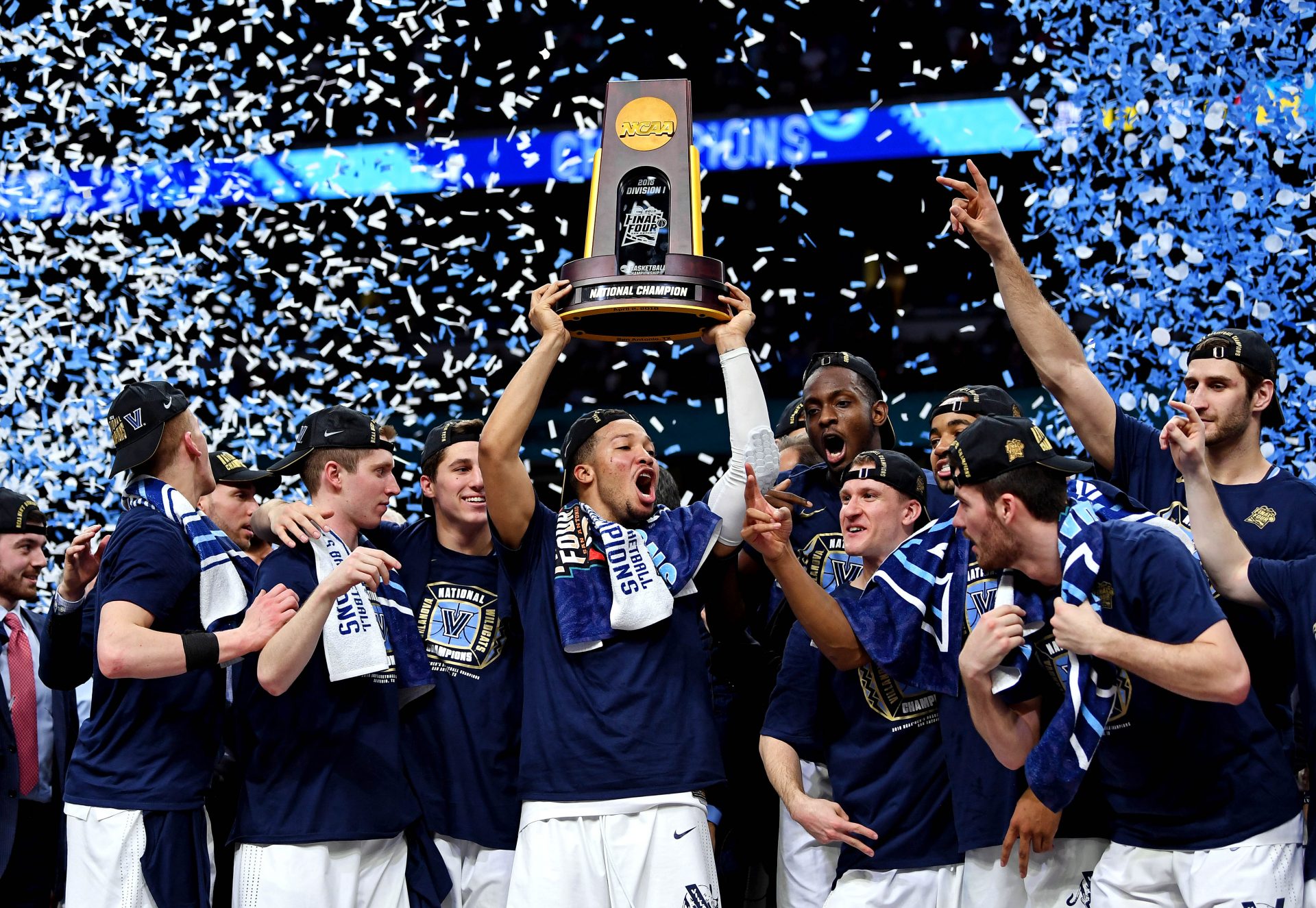 Villanova Wildcats guard Jalen Brunson (1) celebrates with the National Championship trophy after beating the Michigan Wolverines in the championship game of the 2018 men's Final Four at Alamodome.