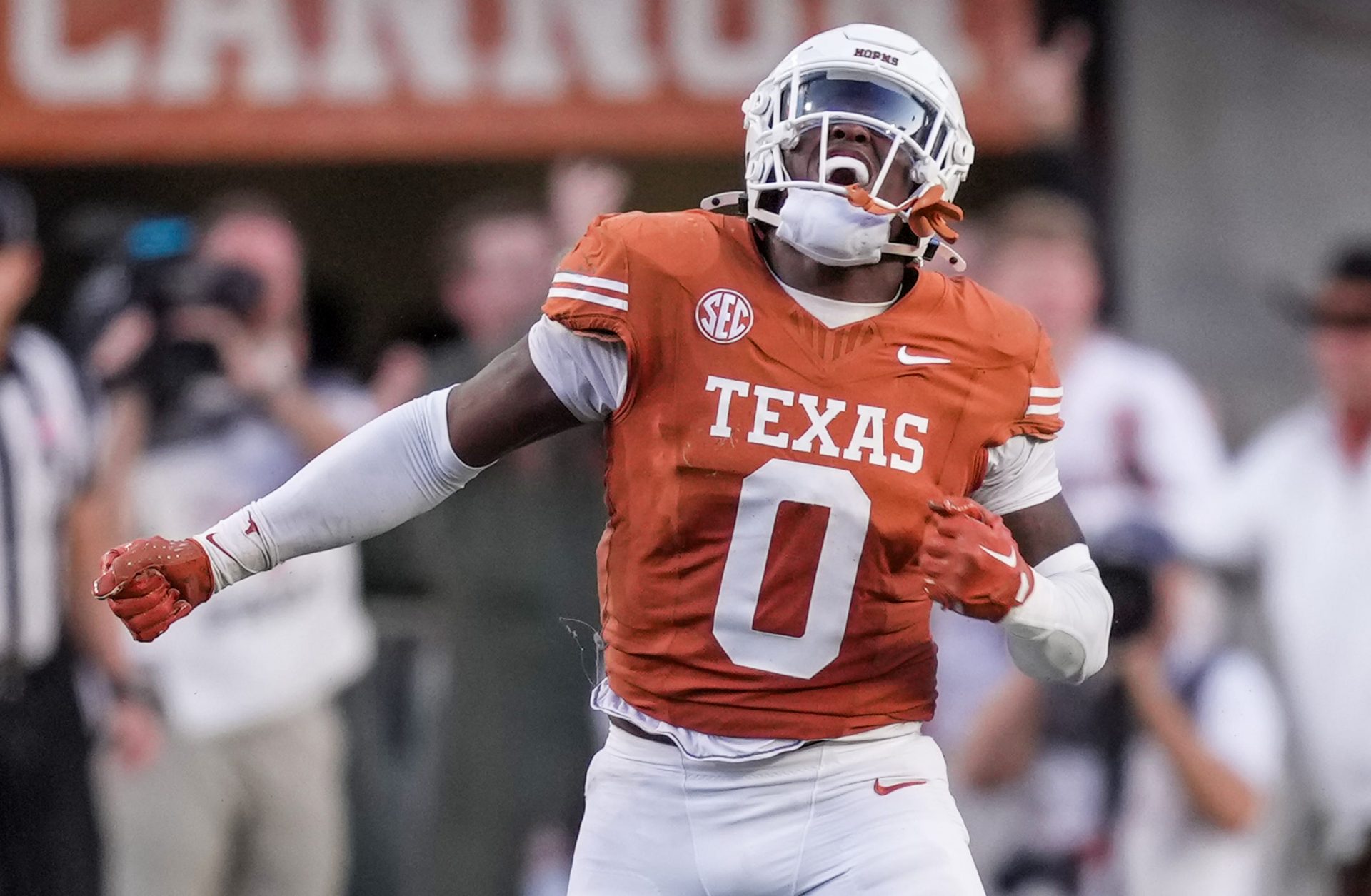 Texas Longhorns linebacker Anthony Hill Jr. (0) celebrates a stop on fourth down against Kentucky Wildcats in the third quarter during the second half of an NCAA college football game at Darrell K Royal Texas Memorial Stadium, Austin, Texas, Saturday, Nov 24, 2024.