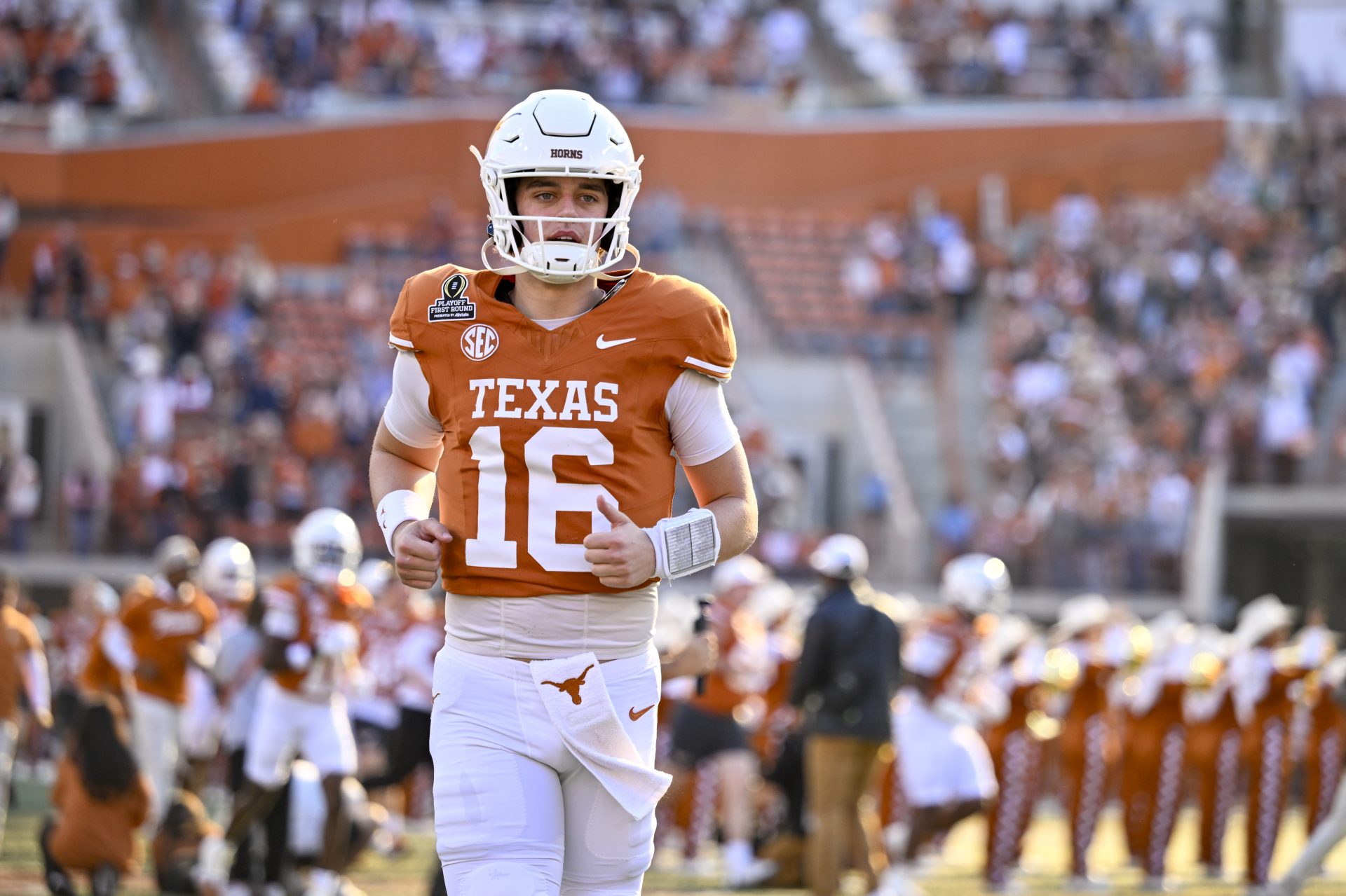 Texas Longhorns quarterback Arch Manning (16) takes the field before the game between the Texas Longhorns and the Clemson Tigers in the CFP National Playoff First Round at Darrell K Royal-Texas Memorial Stadium.