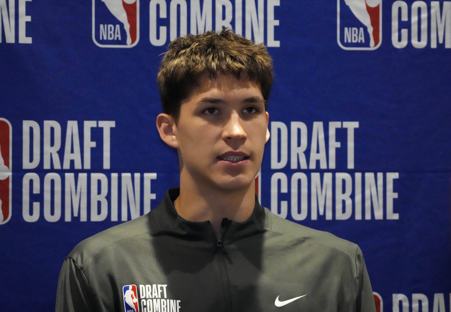 Egor Demin talks to the media during the 2025 NBA Draft Combine at Marriott Marquis Chicago.