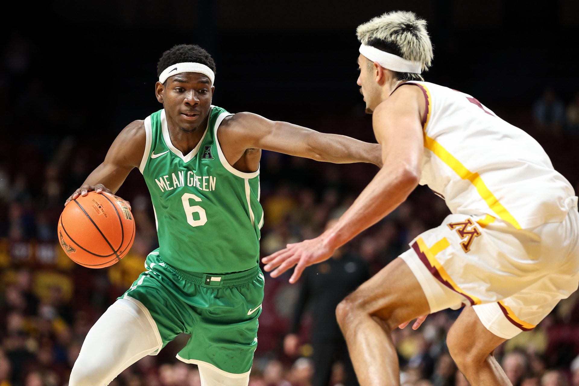 North Texas Mean Green forward Brenen Lorient (6) works around Minnesota Golden Gophers forward Dawson Garcia (3) during the second half at Williams Arena.