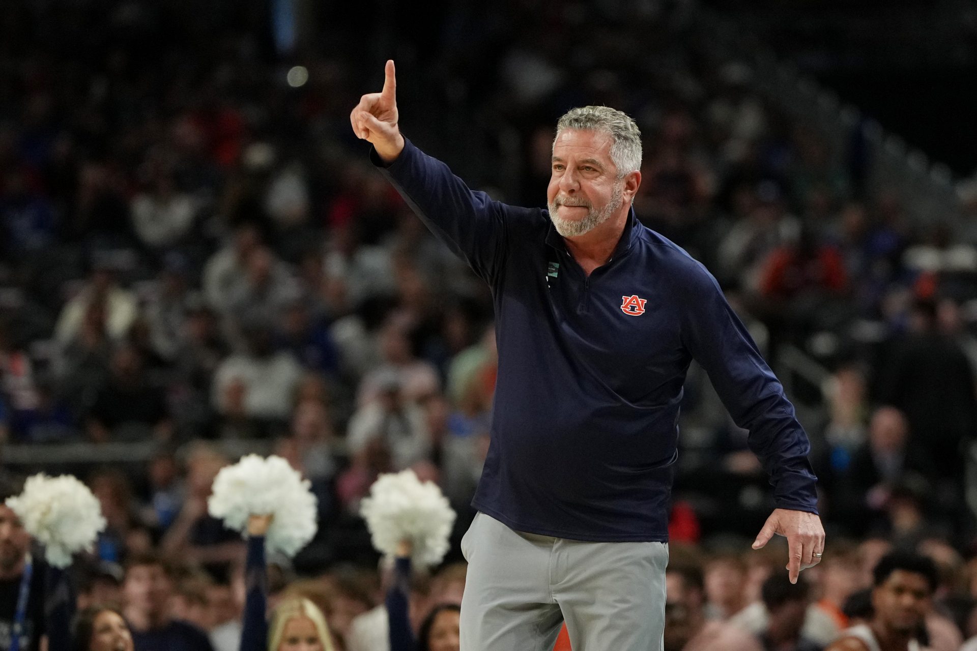 Auburn Tigers head coach Bruce Pearl signals to players against the Florida Gators during the first half in the semifinals of the men's Final Four of the 2025 NCAA Tournament at the Alamodome.