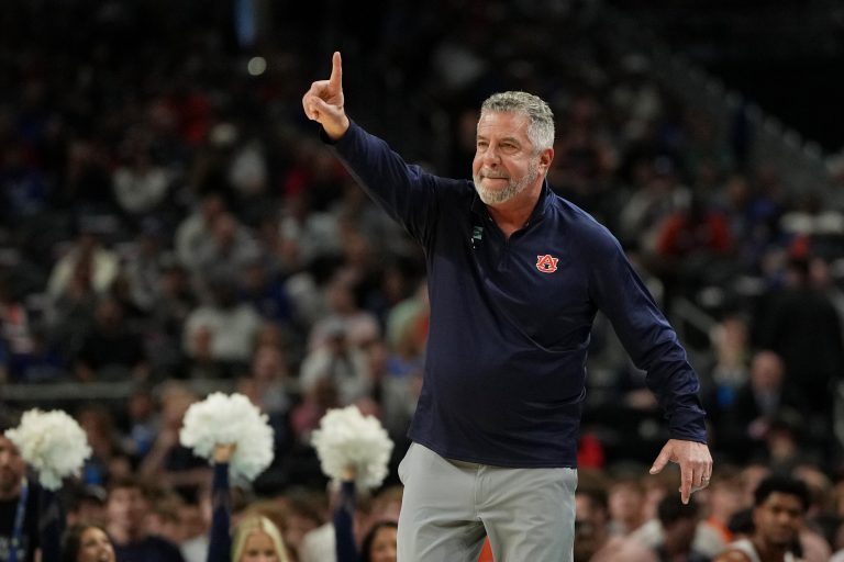 Auburn Tigers head coach Bruce Pearl signals to players against the Florida Gators during the first half in the semifinals of the men's Final Four of the 2025 NCAA Tournament at the Alamodome.