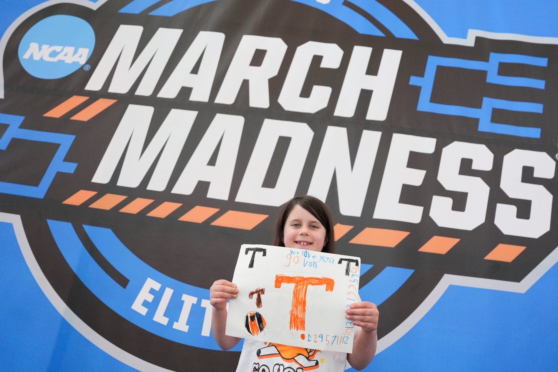 Everly, a young Lady Vols fan shows off a custom made sign she brought to the Sweet 16 game between Tennessee and Texas at the NCAA college basketball tournament on Saturday, March 29, 2025, in Birmingham, AL.