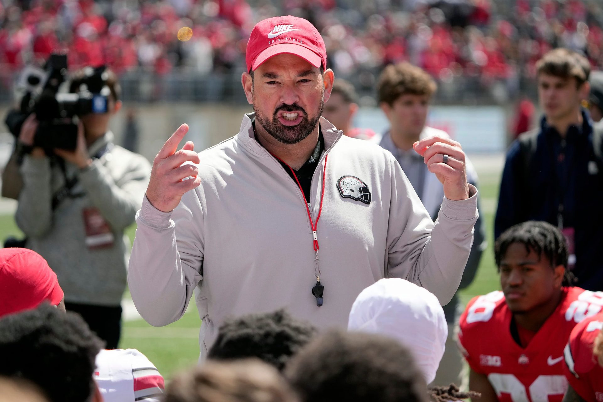 Ohio State Buckeye head coach Ryan Day addresses his team after the spring game