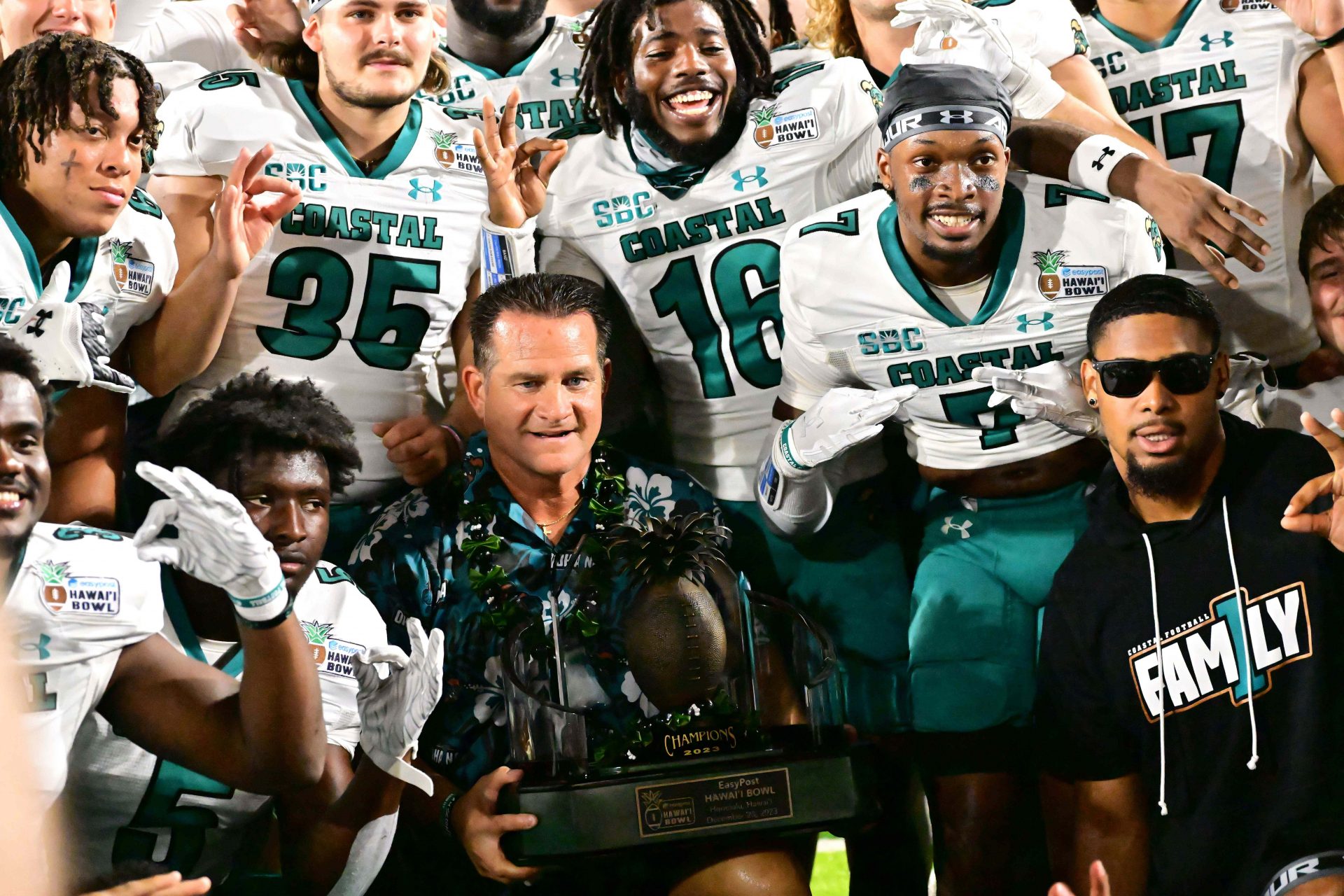 Coastal Carolina Chanticleers head coach Tim Beck celebrates with his team after defeating the San Jose Spartans to win the Easypost Hawaii Bowl at Clarence T.C. Ching Athletics Complex.