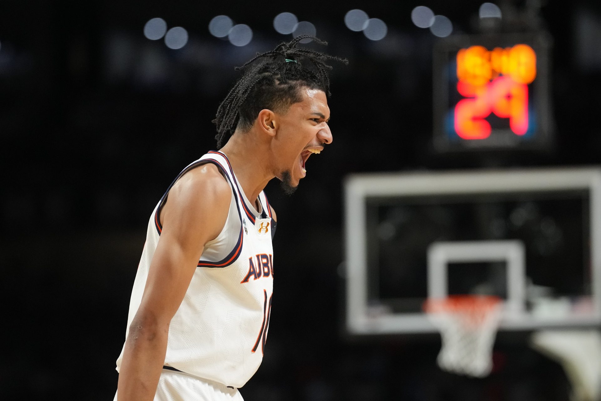 Auburn Tigers guard Chad Baker-Mazara (10) reacts after making a three point basket against the Florida Gators in the semifinals of the men's Final Four of the 2025 NCAA Tournament at the Alamodome.