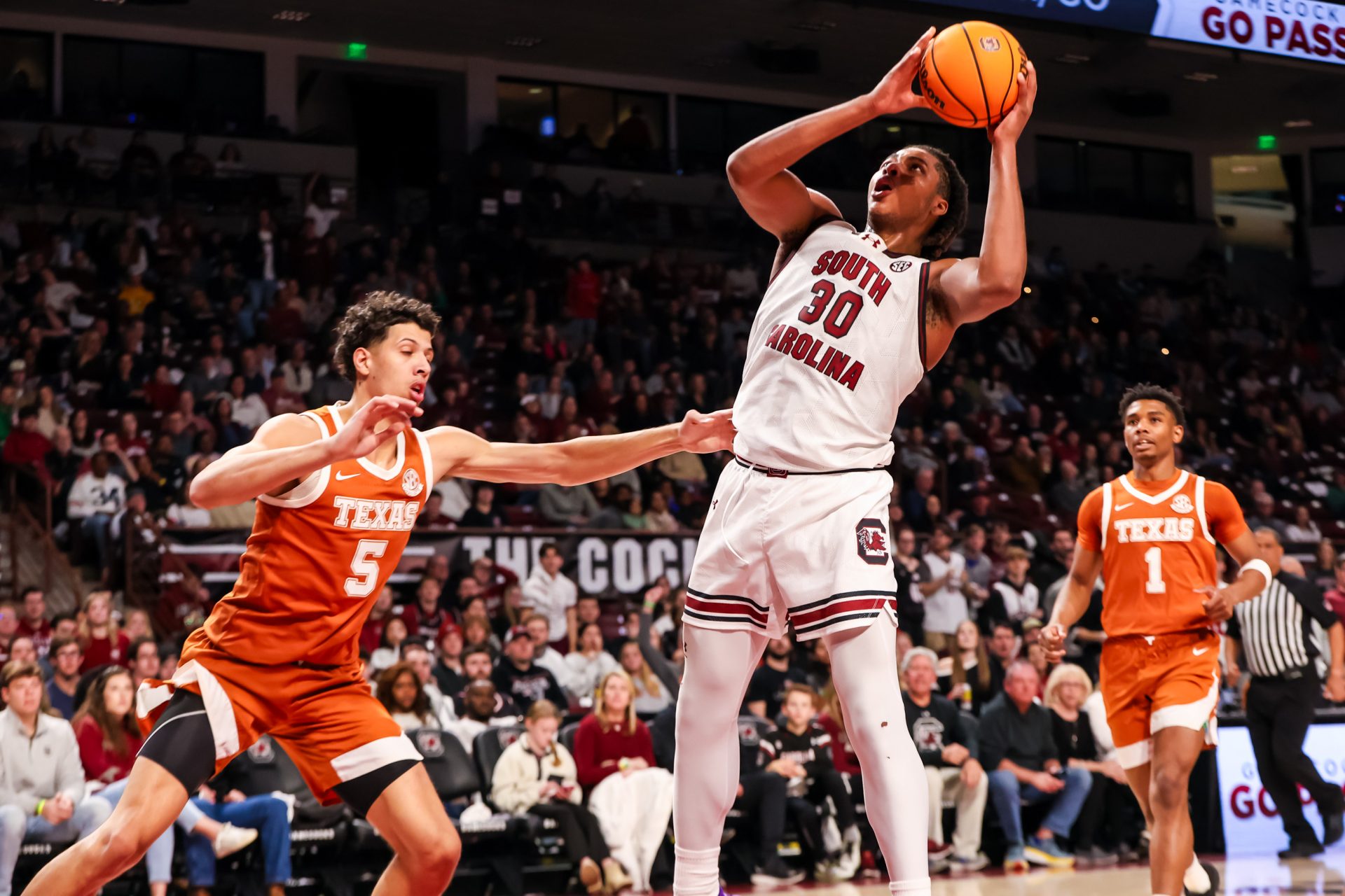 South Carolina Gamecocks forward Collin Murray-Boyles (30) shoots over Texas Longhorns forward Kadin Shedrick (5) in the first half at Colonial Life Arena.