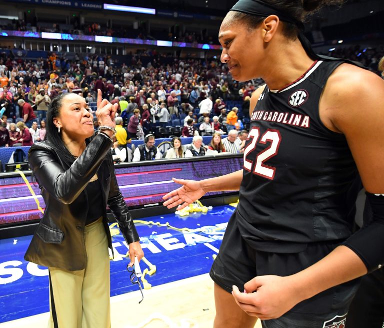 South Carolina Gamecocks head coach Dawn Staley celebrates with forward A'ja Wilson (22) after a win over the Mississippi State Lady Bulldogs during the SEC Conference Tournament championship game at Bridgestone Arena.