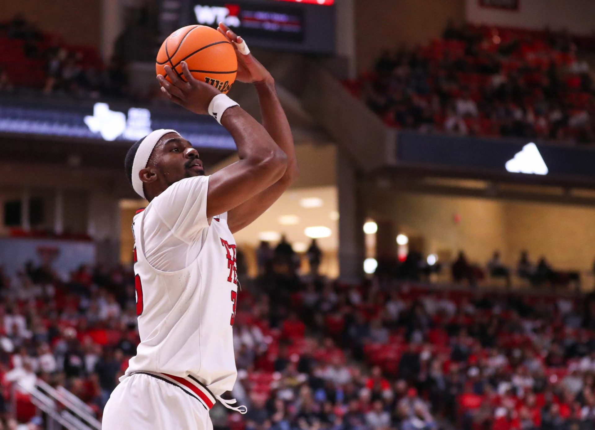Texas Tech's Devan Cambridge shoots a 3-pointer against Wyoming during a non-conference basketball game, Wednesday, Nov. 13, 2024, in United Supermarkets Arena.