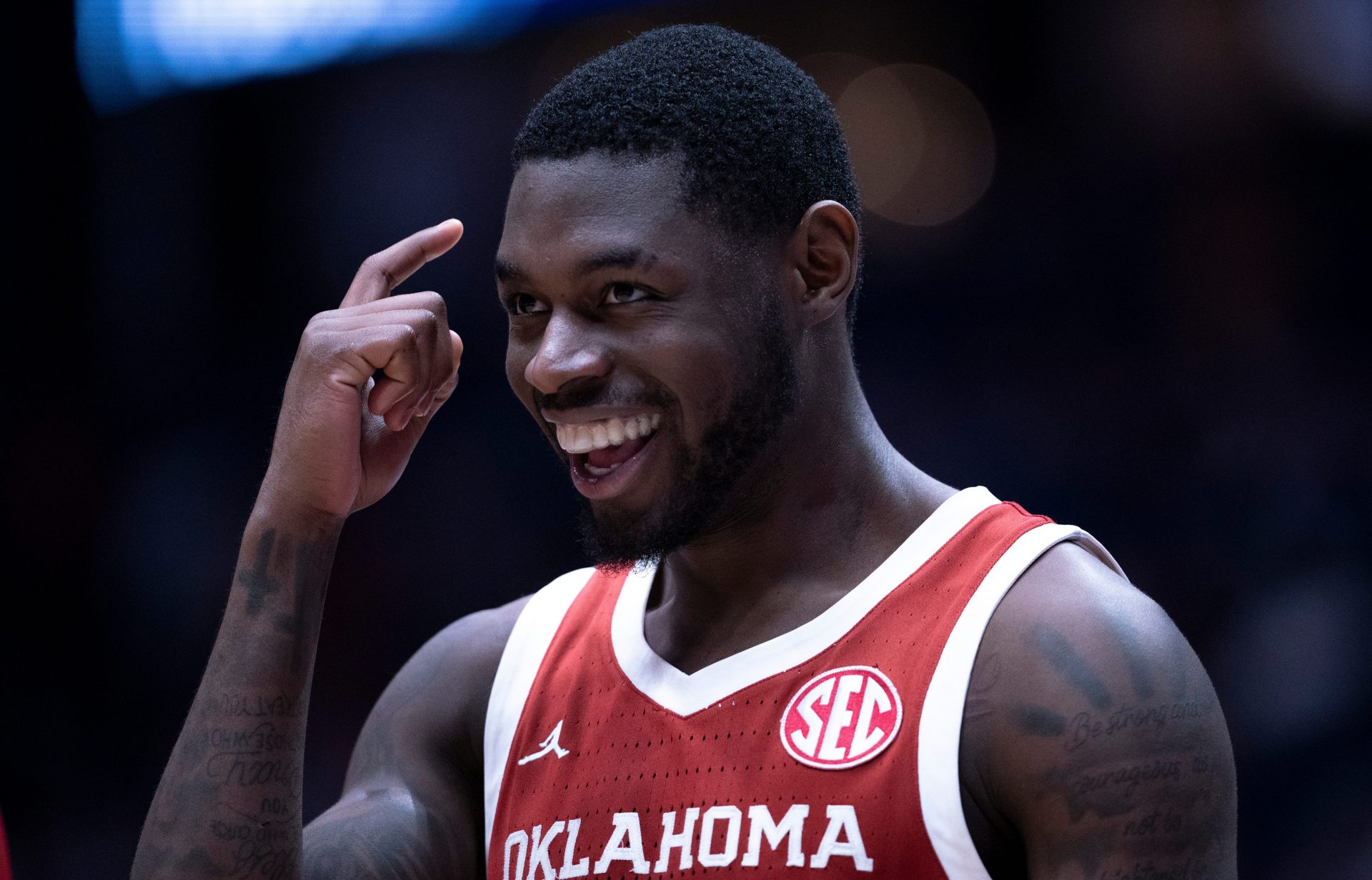 Oklahoma Sooners guard Duke Miles (15) reacts to his late-game play against the Georgia Bulldogs during their first round game of the SEC Men's Basketball Tournament at Bridgestone Arena in Nashville, Tenn., Wednesday, March 12, 2025. Instead of grabbing the ball that was rolling toward their goal, Miles let it go and forced the Georgia Bulldogs player to grab it for a backcourt violation.