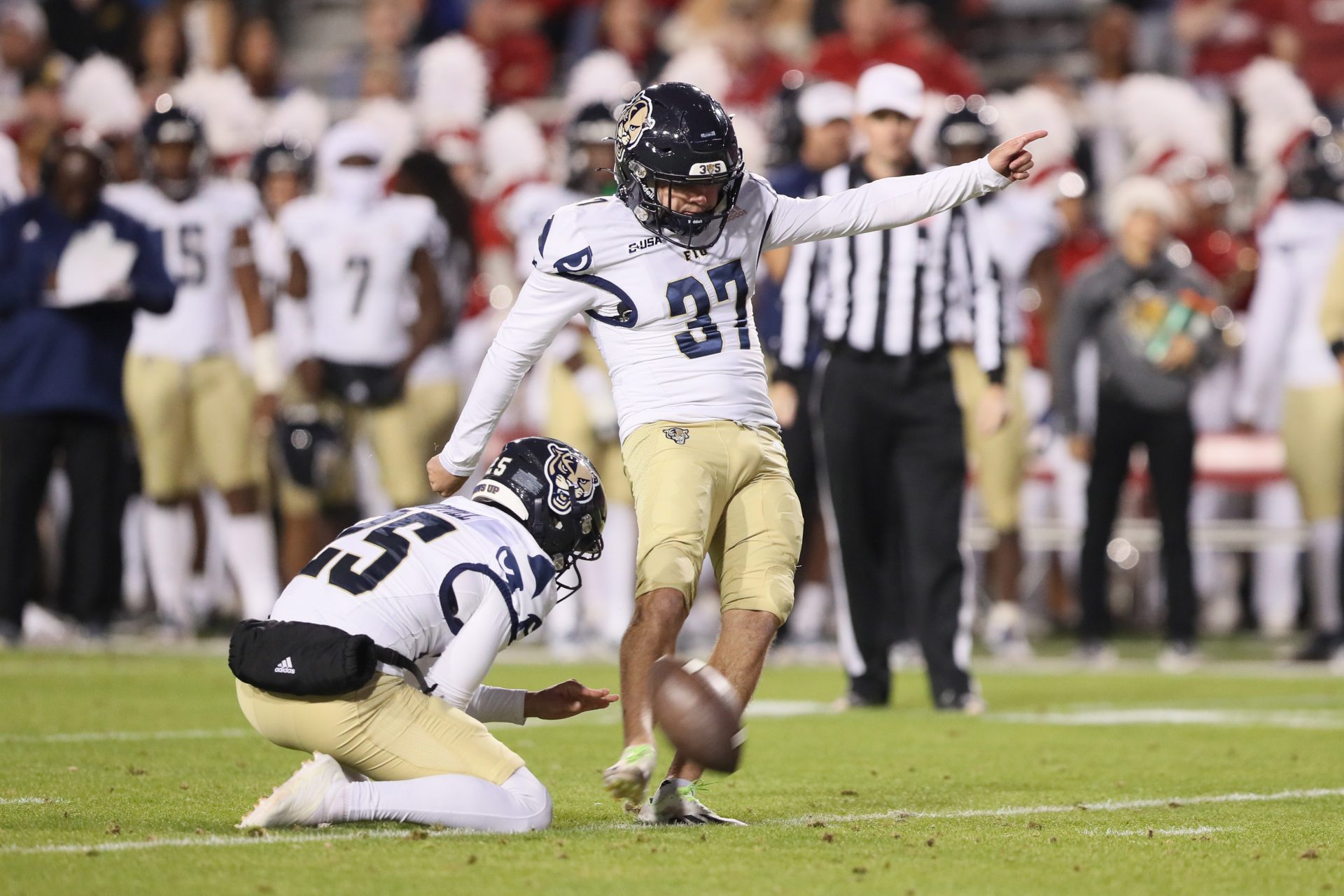 FIU Panthers kicker Chase Gabriel (37) misses a field goal in the second quarter against the Arkansas Razorbacks at Donald W. Reynolds Razorback Stadium.