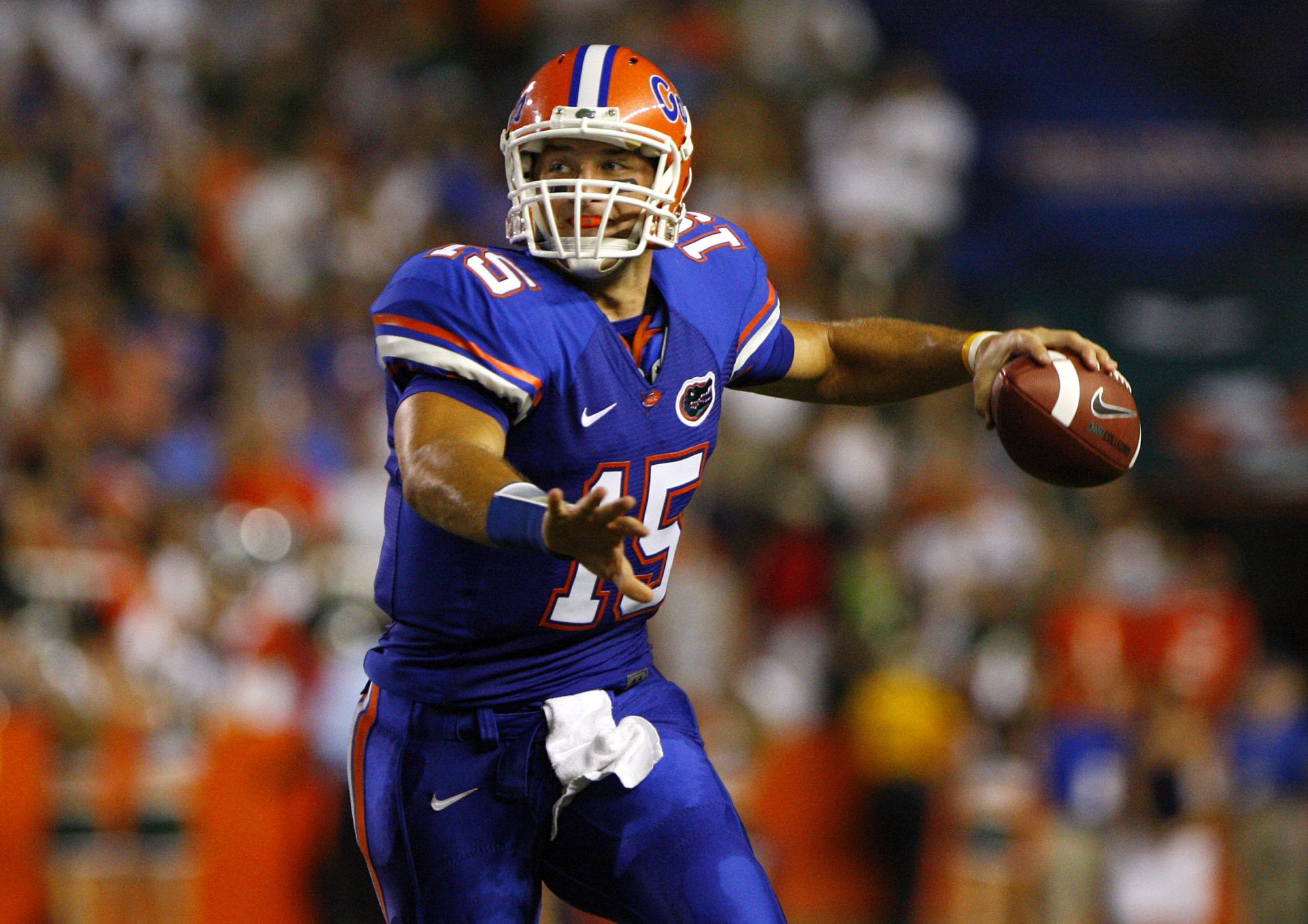Florida Gators quarterback Tim Tebow (15) gets ready to thrown the ball against the Miami Hurricanes during the first half at Ben Hill Griffin Stadium.