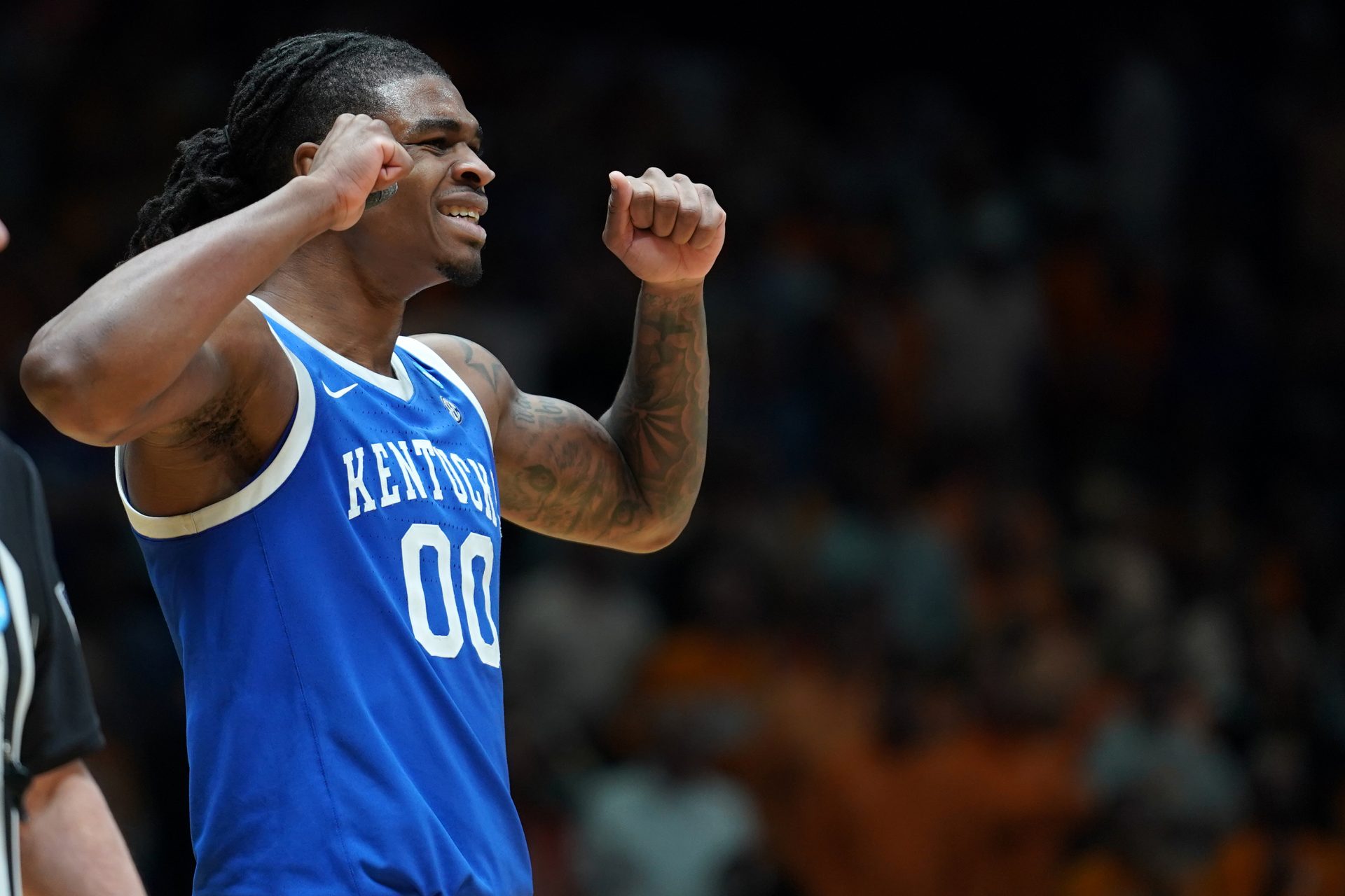 Kentucky Wildcats guard Otega Oweh (00) reacts against the Tennessee Volunteers in the second half during a Midwest Regional semifinal of the 2025 NCAA tournament at Lucas Oil Stadium.