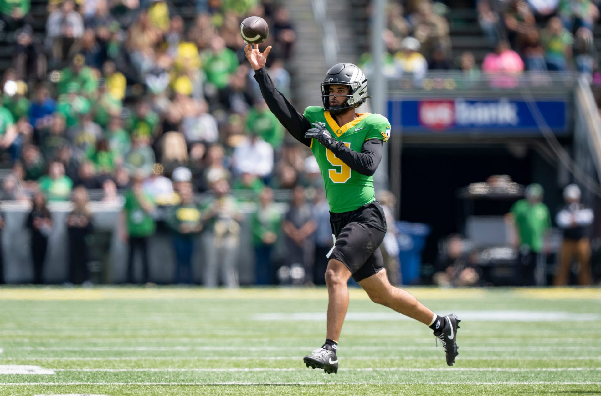 Fighting Ducks quarterback Dante Moore throws out a pass as the Fighting Ducks face off against Mighty Oregon in the Oregon Ducks