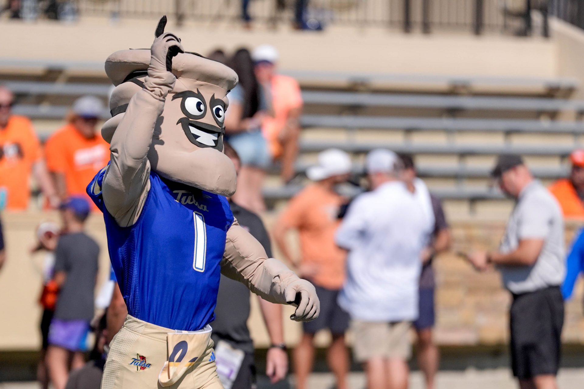 Tulsa mascot Gus T. runs on the field during an NCAA football game between Oklahoma State and Tulsa in Tulsa, Okla., on Saturday, Sept. 14, 2024.