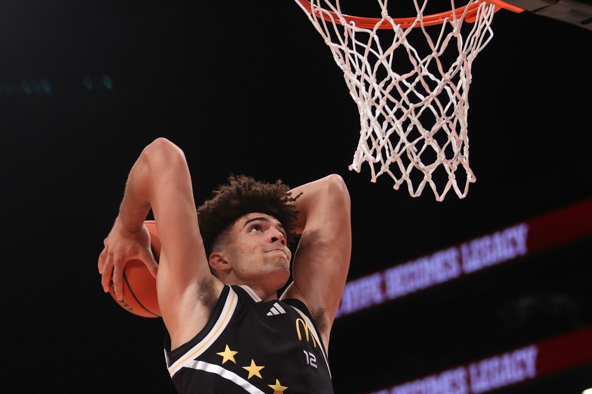 McDonald's All American East forward Cameron Boozer (12) dunks the ball during the second half of the game at Barclays Center.