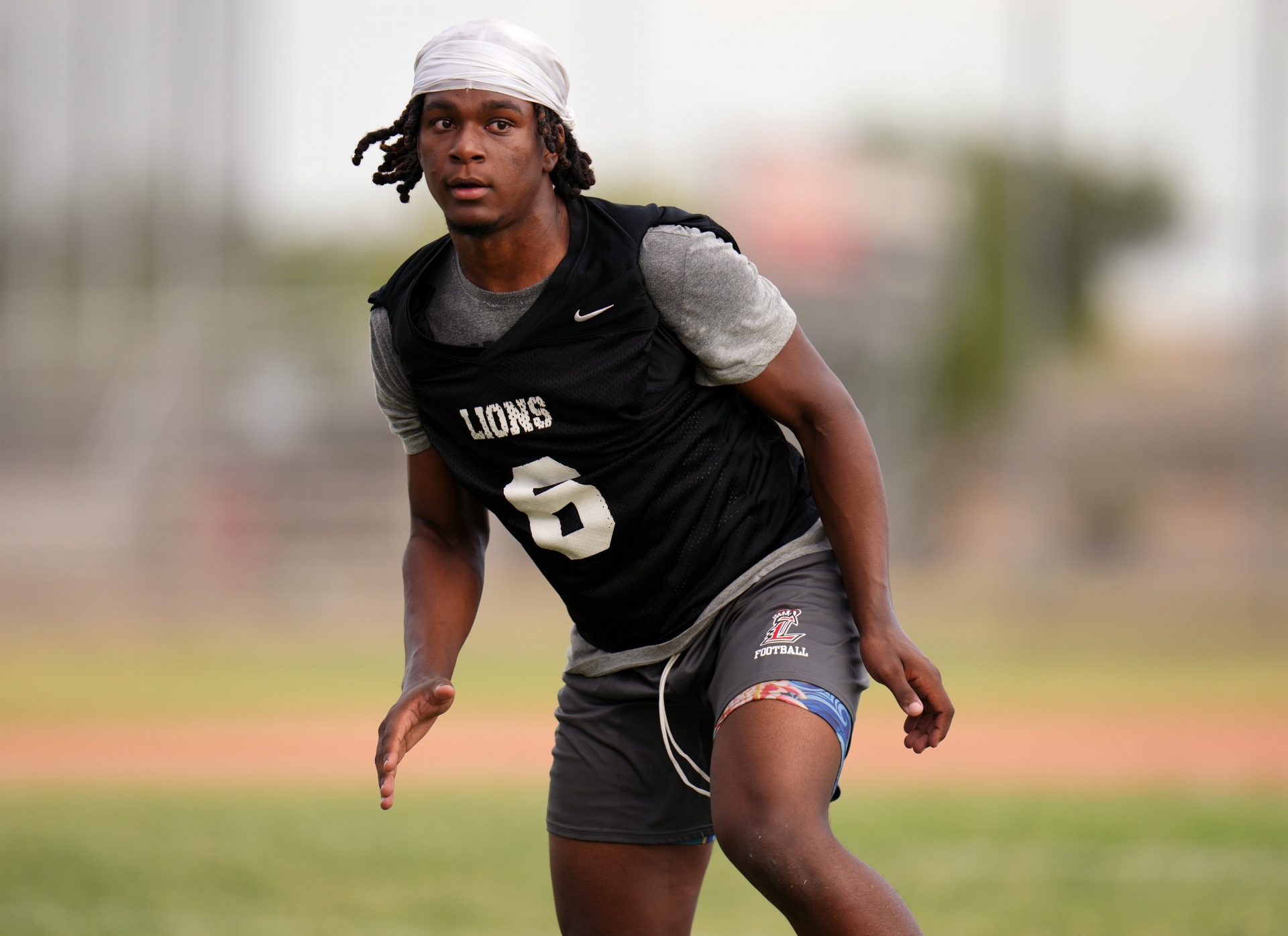 Linebacker Hudson Dunn watches as the play develops from the backfield as the varsity football team practices at Liberty High School in Peoria