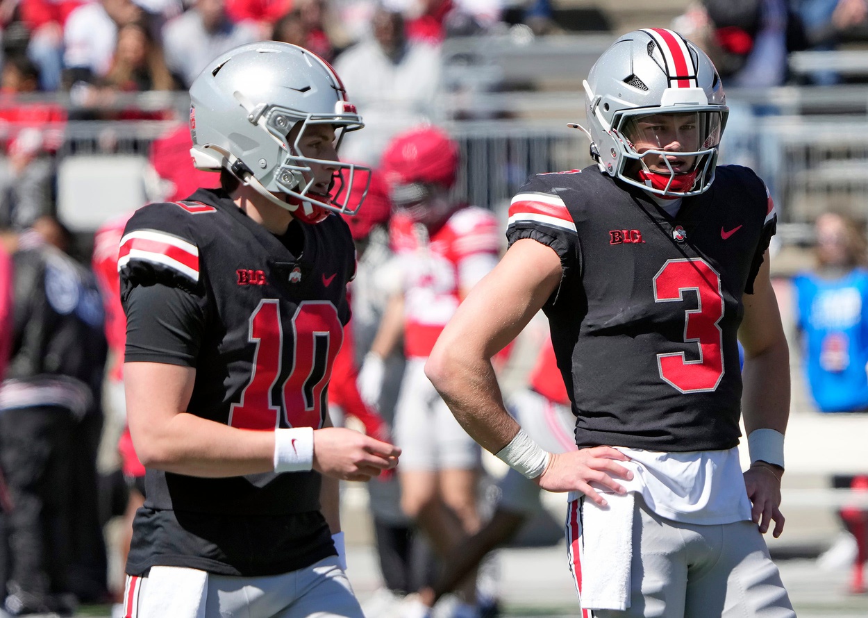 Ohio State Buckeye quarterbacks Julian Sayin (10) and Lincoln Kienholz (3) warm up before the start of the spring game at Ohio Stadium on April 12, 2025.