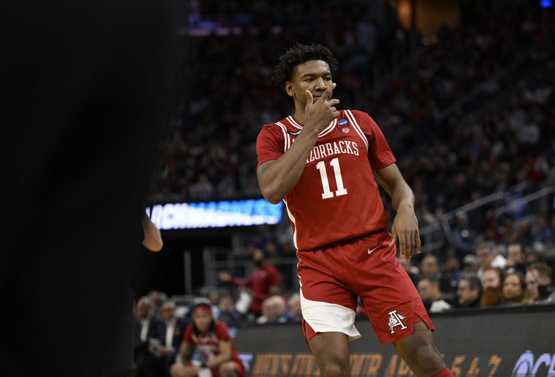 Arkansas Razorbacks forward Karter Knox (11) celebrates a three point basket during the first half against the Texas Tech Red Raiders during a West Regional semifinal of the 2025 NCAA tournament at Chase Center.