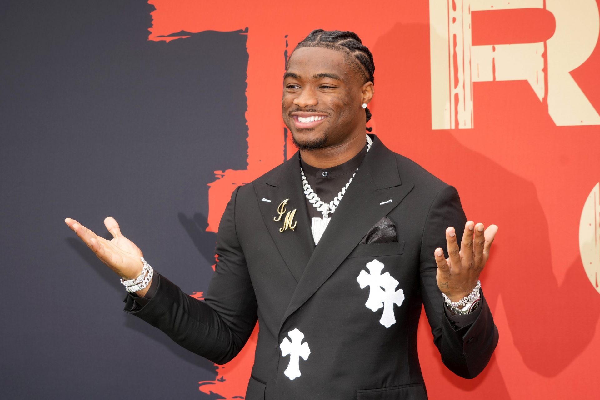 Alabama Crimson Tide quarterback Jalen Milroe on the red carpet before the 2025 NFL Draft at Lambeau Field.