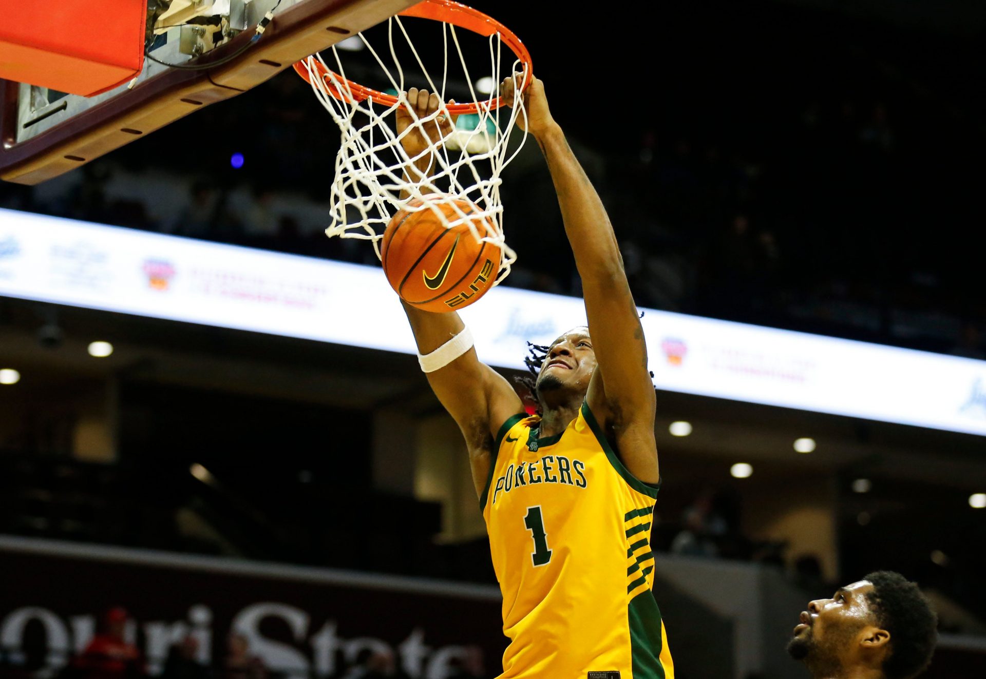 Oak Ridges' (Florida) Jamier Jones dunks the ball as the Pioneers took on the Christ the King Royals in a semifinal game of the Bass Pro Tournament of Champions at Great Southern Bank Arena on Friday, Jan. 17, 2025.