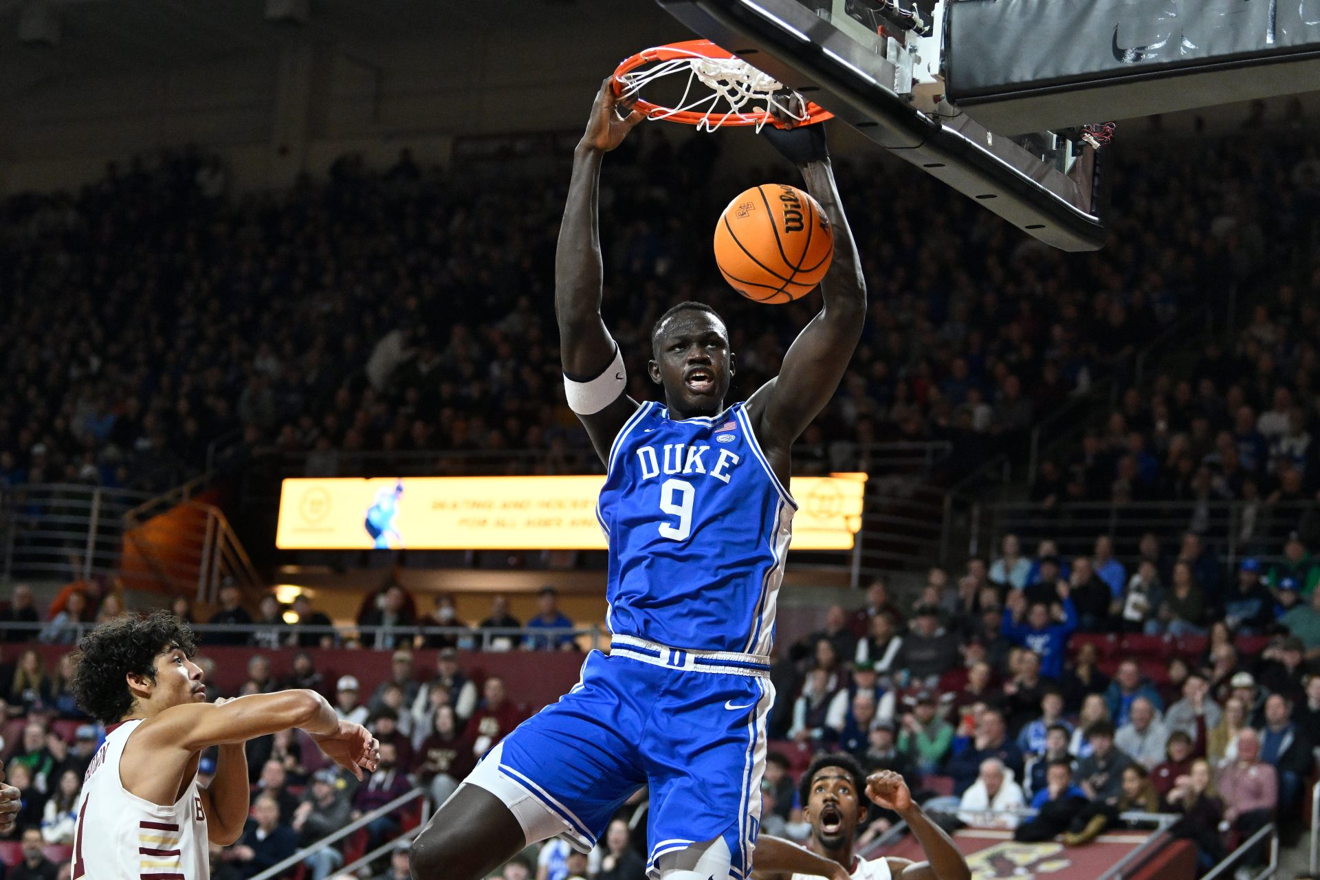 Duke Blue Devils center Khaman Maluach (9) dunks the ball against the Boston College Eagles during the first half at Conte Forum.