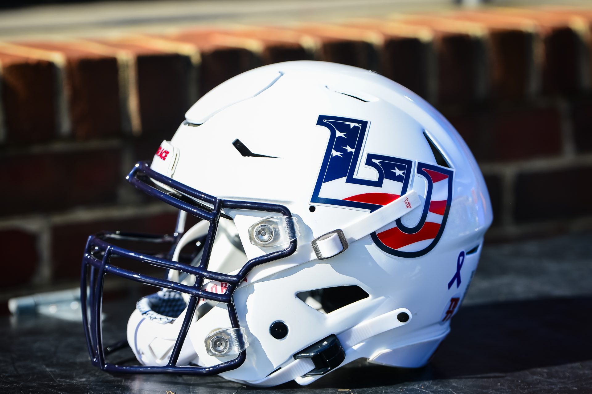 A Liberty Flames helmet before a game at Williams Stadium.