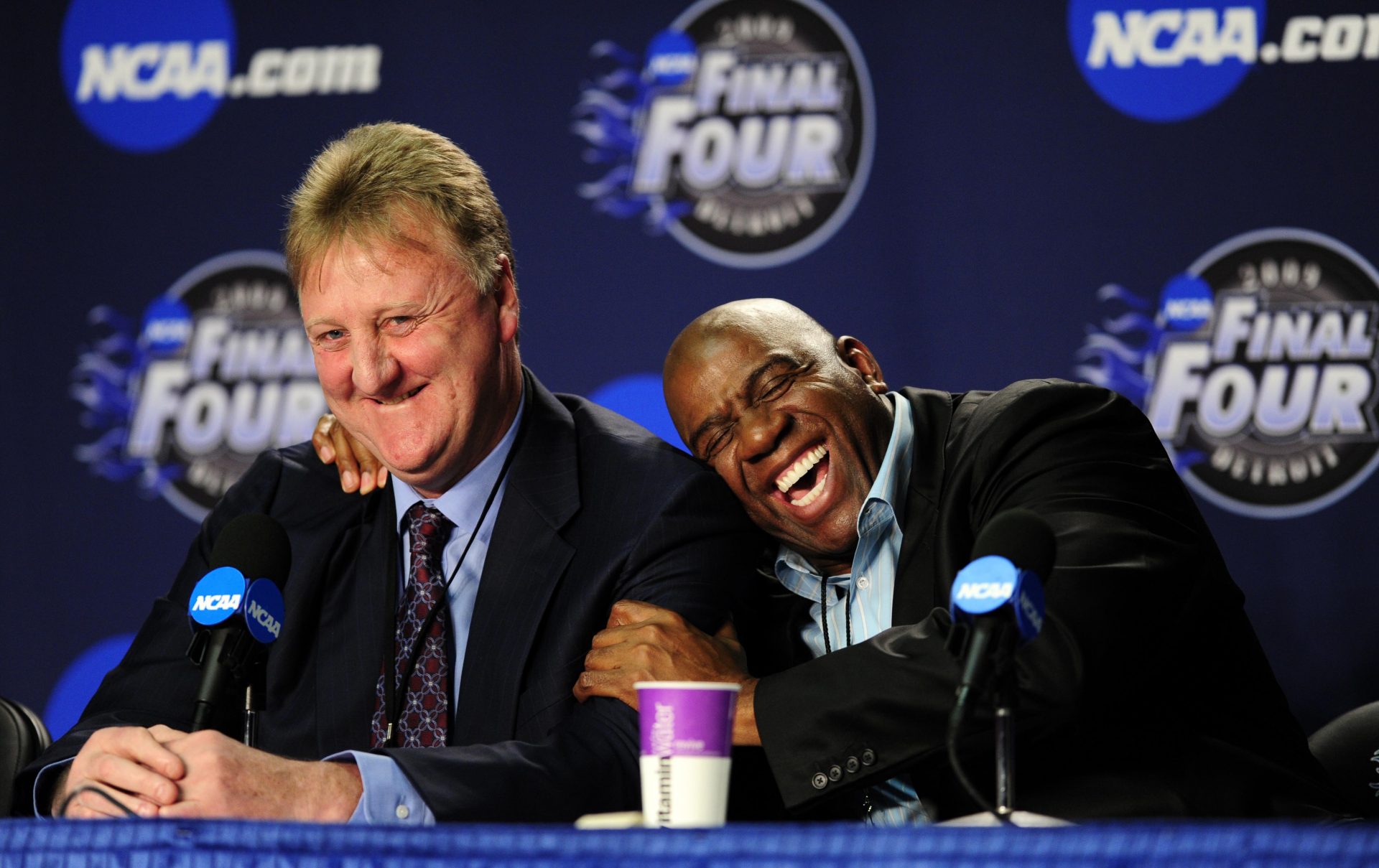 Michigan State Spartans and NBA former player Magic Johnson (right) hugs NBA former player Larry Bird (left) during a press conference before the championship game of the Final Four in the 2009 NCAA mens basketball tournament against the North Carolina Tar Heels at Ford Field.