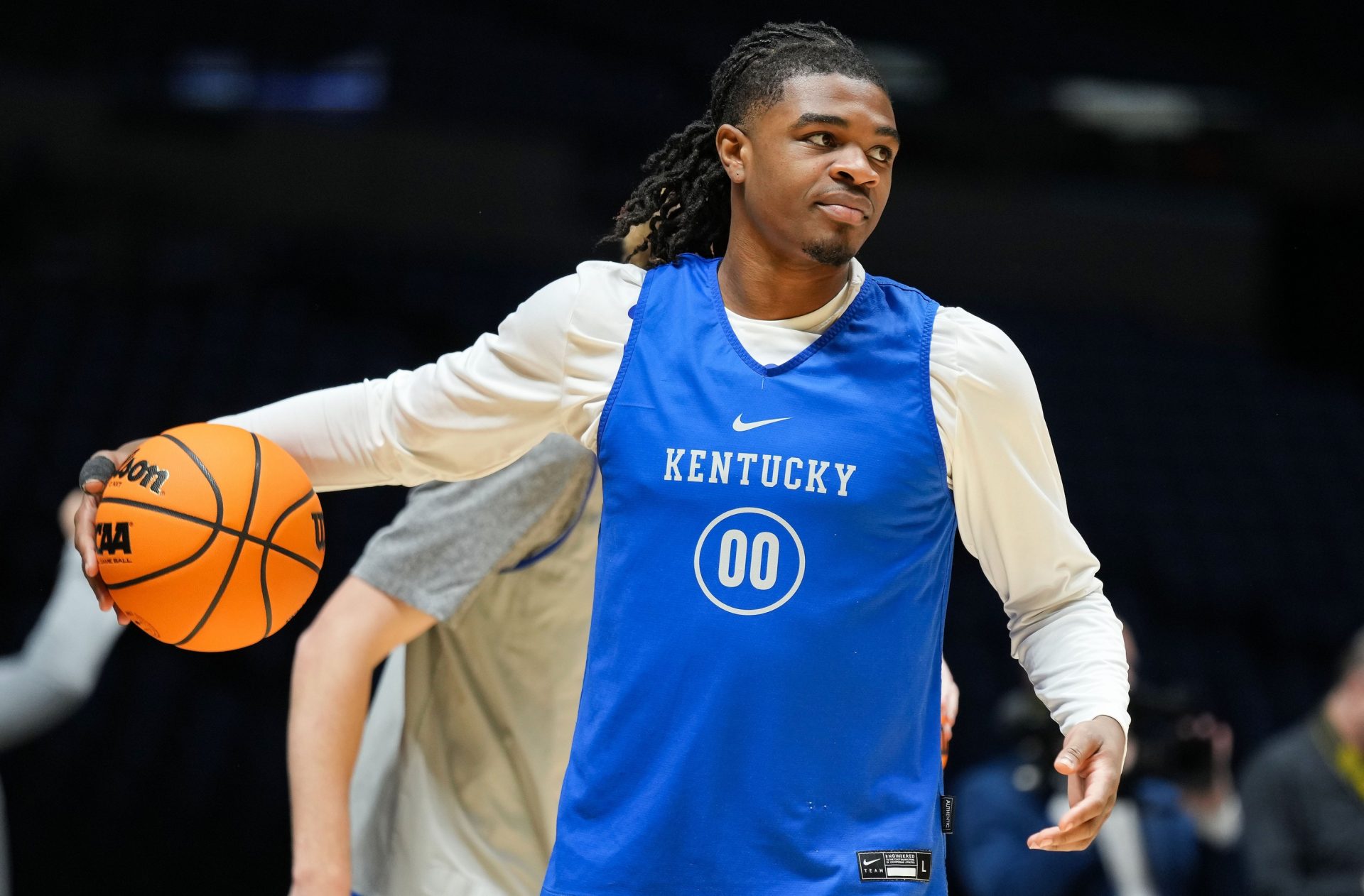Kentucky Wildcats guard Otega Oweh (00) warms-up Thursday, March 27, 2025, during practice ahead of the Sweet 16 March Madness tournament game against the Tennessee Volunteers at Lucas Oil Stadium in Indianapolis.