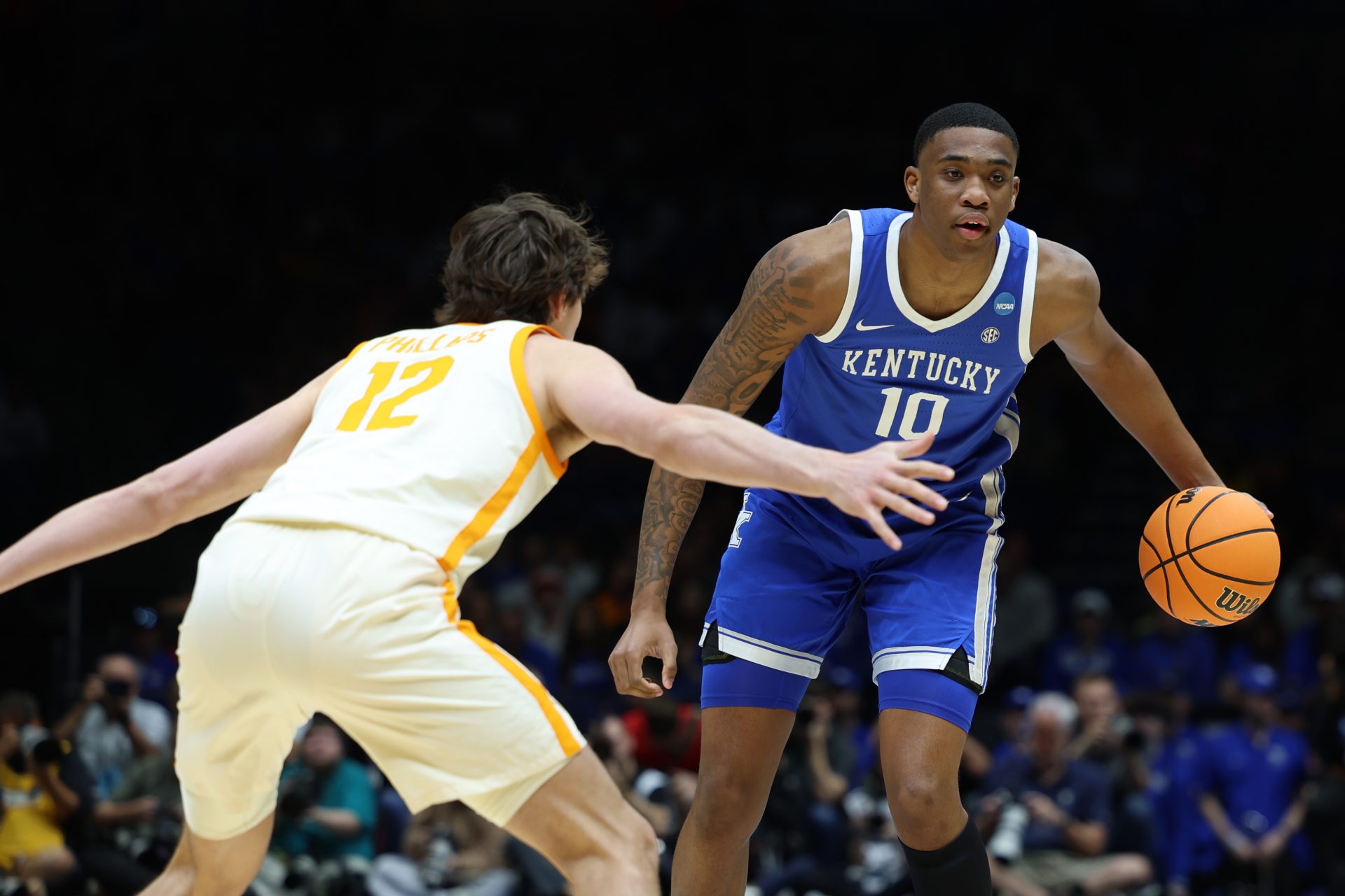 Kentucky Wildcats forward Brandon Garrison (10) dribbles the ball against Tennessee Volunteers forward Cade Phillips (12) in the first half during a Midwest Regional semifinal of the 2025 NCAA tournament at Lucas Oil Stadium.