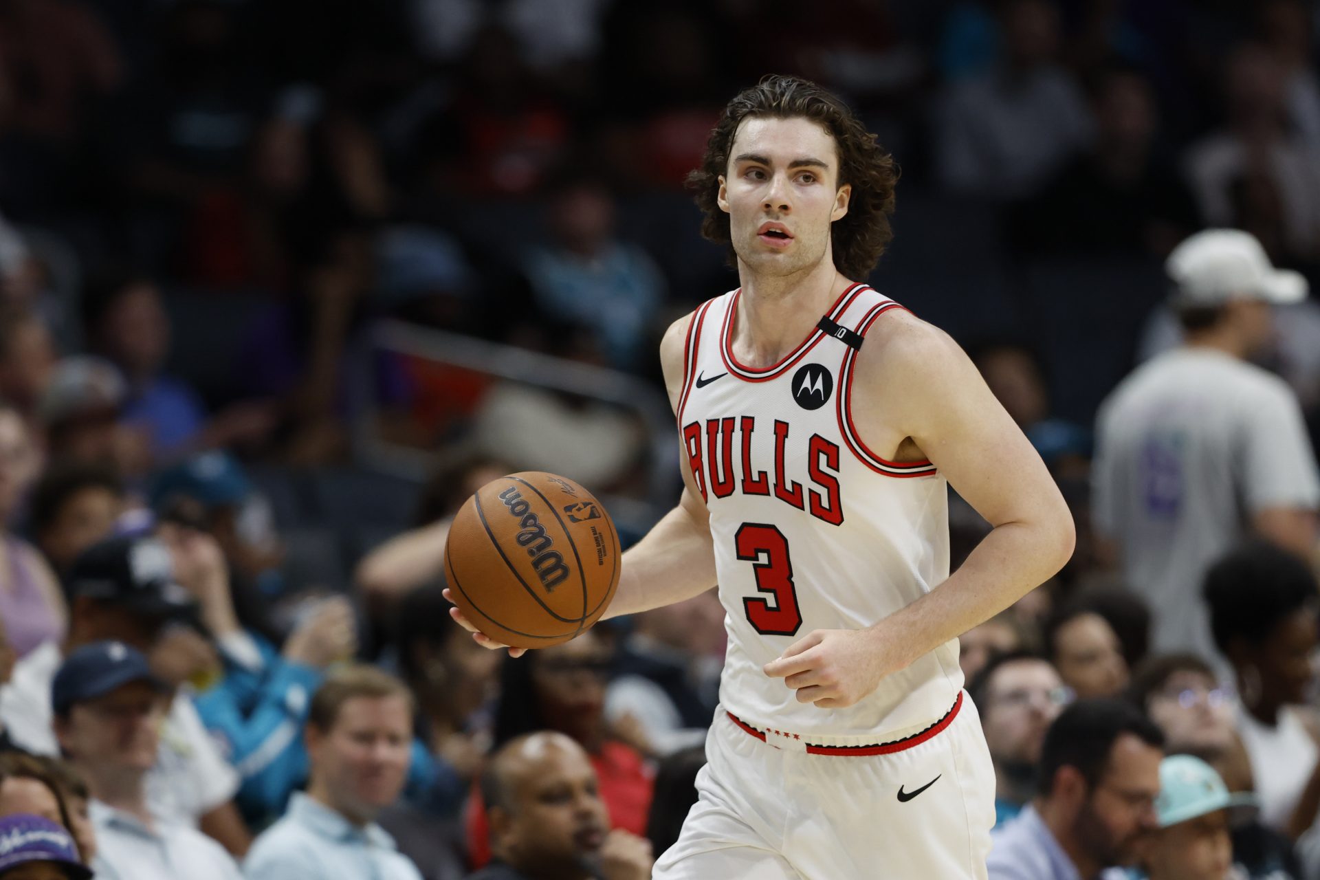 Chicago Bulls guard Josh Giddey (3) brings the ball upcourt against the Charlotte Hornets during the second half at Spectrum Center.