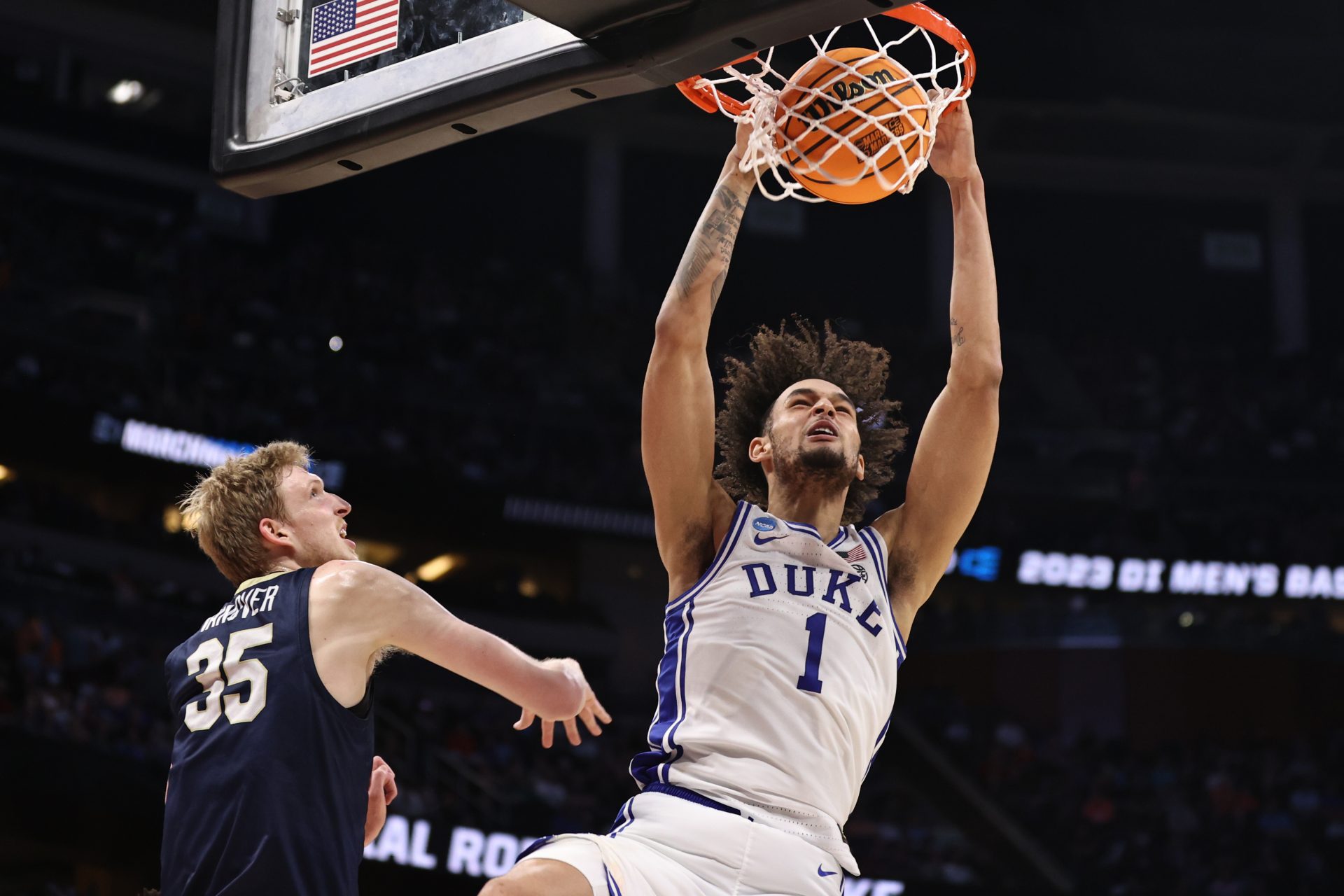 Duke Blue Devils center Dereck Lively II (1) dunks the ball against Oral Roberts Golden Eagles forward Connor Vanover (35) during the first half at Amway Center.