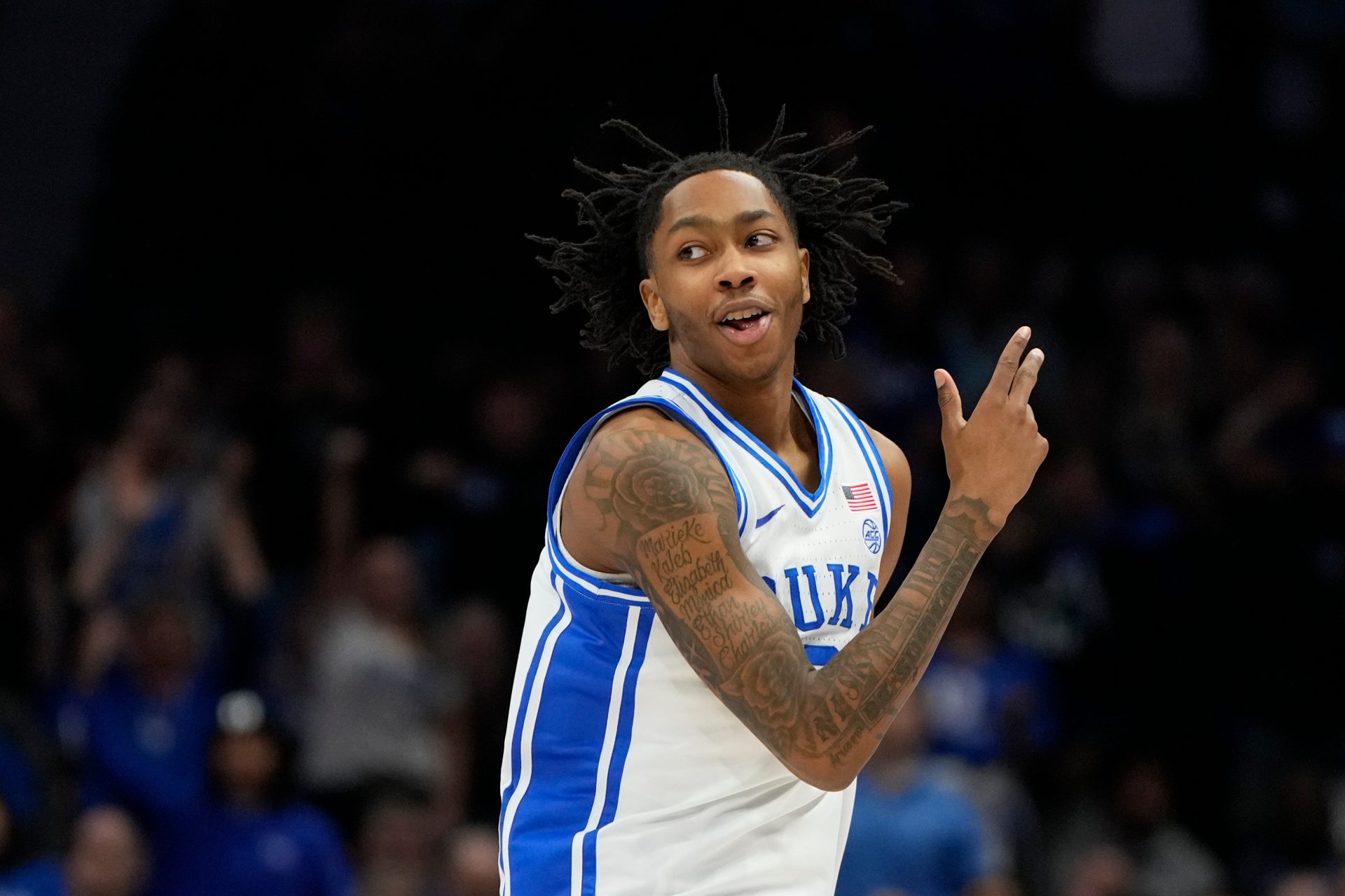 Duke Blue Devils guard Isaiah Evans (3) reacts after hitting a three point shot in the first half at Spectrum Center.